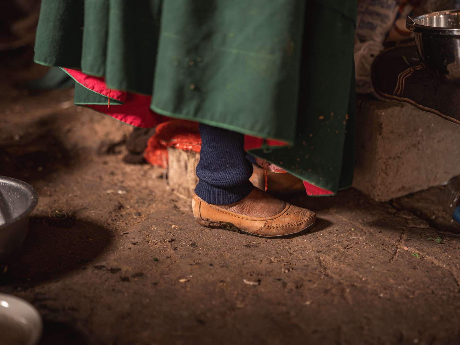 an abstract photo of a curved building with a blue sky in the background