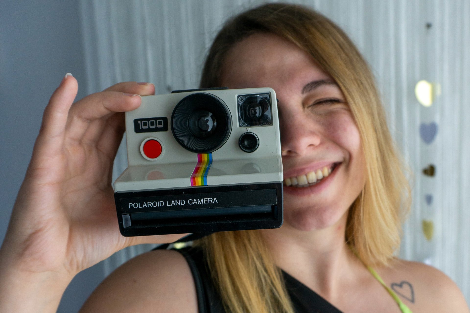 black nikon dslr camera on white printer paper