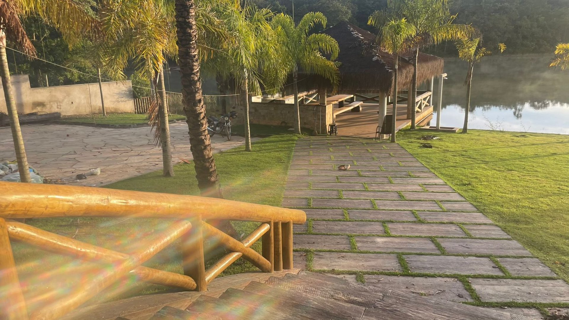 woman wearing yellow long-sleeved dress under white clouds and blue sky during daytime