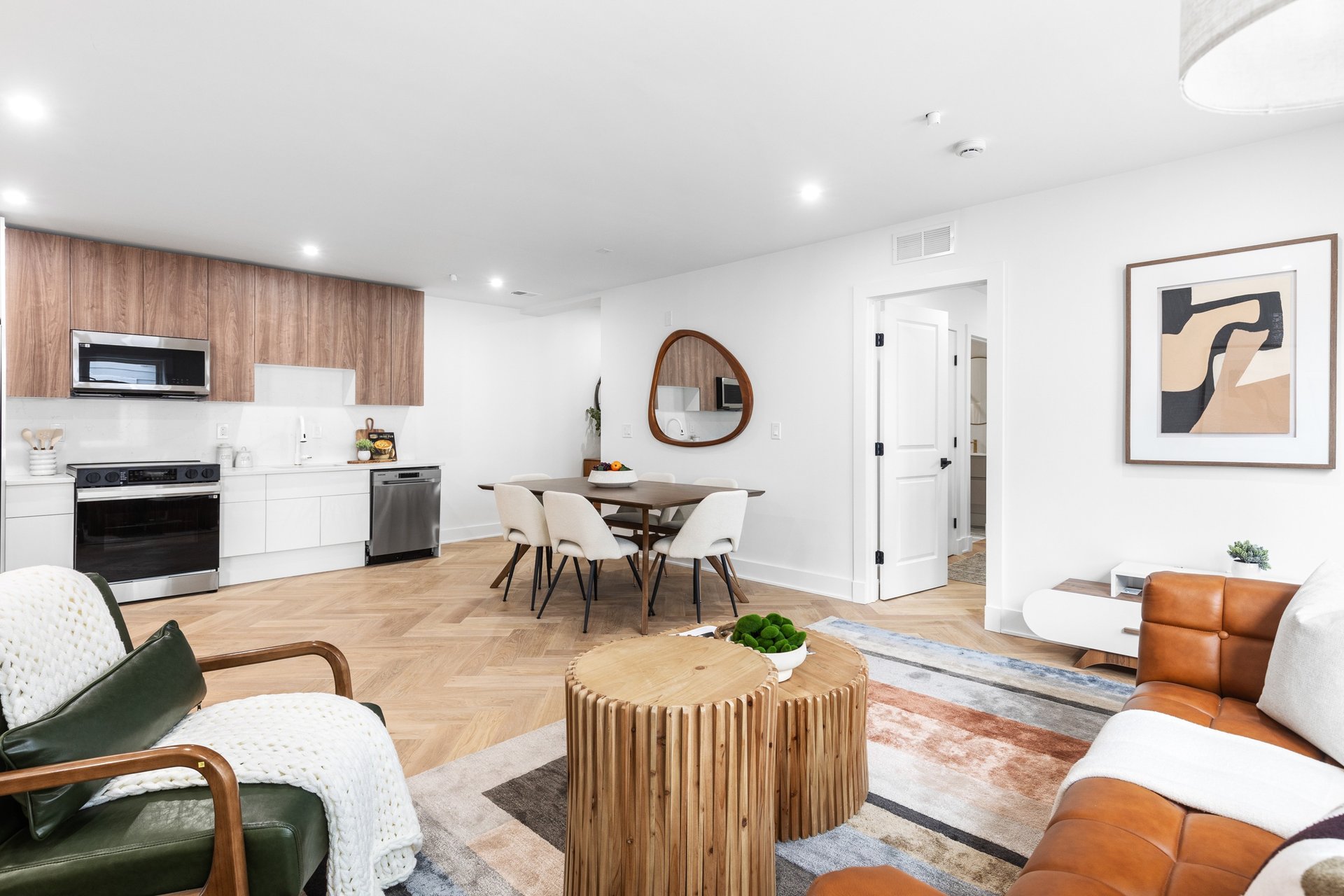 an abstract photo of a curved building with a blue sky in the background