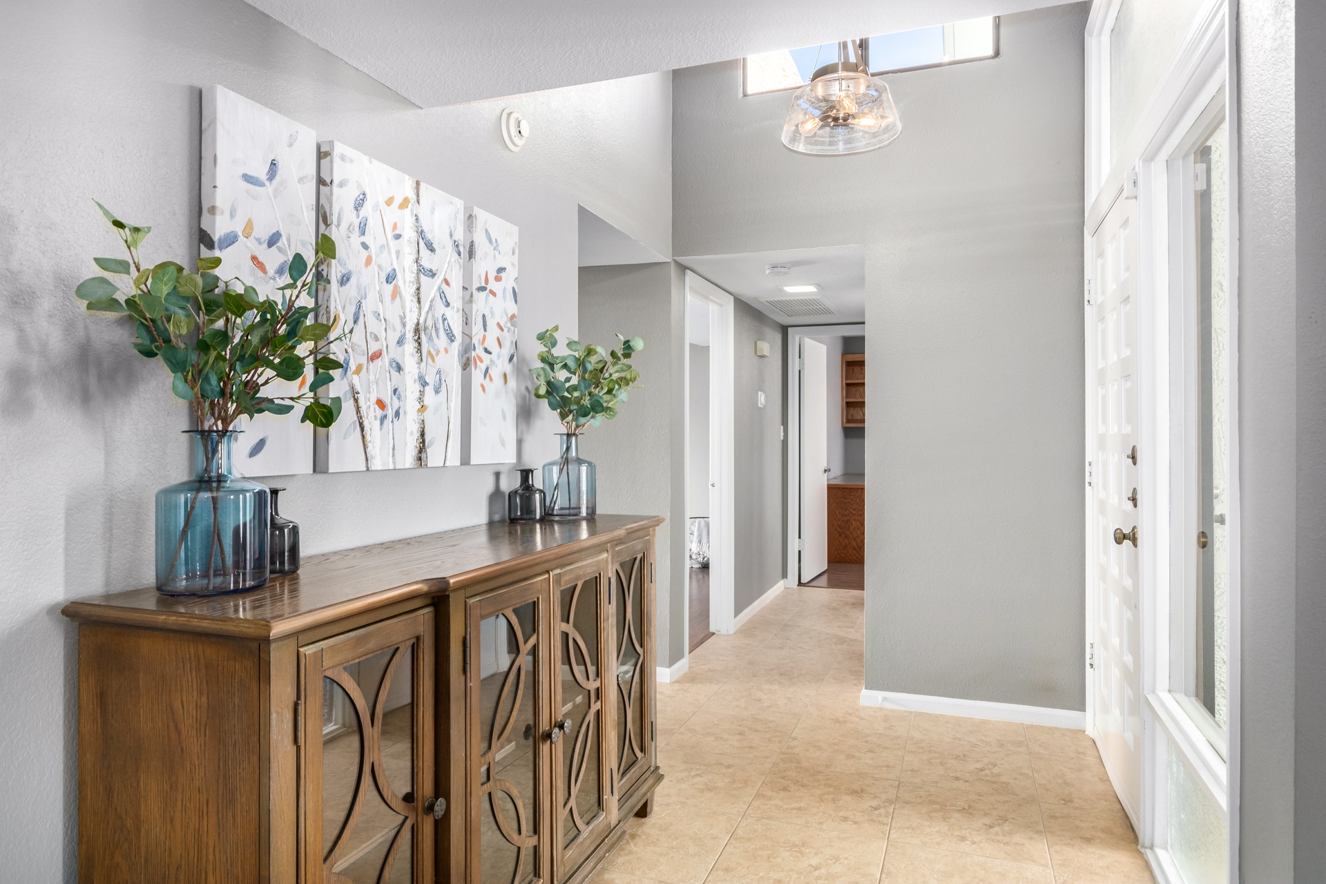 an abstract photo of a curved building with a blue sky in the background