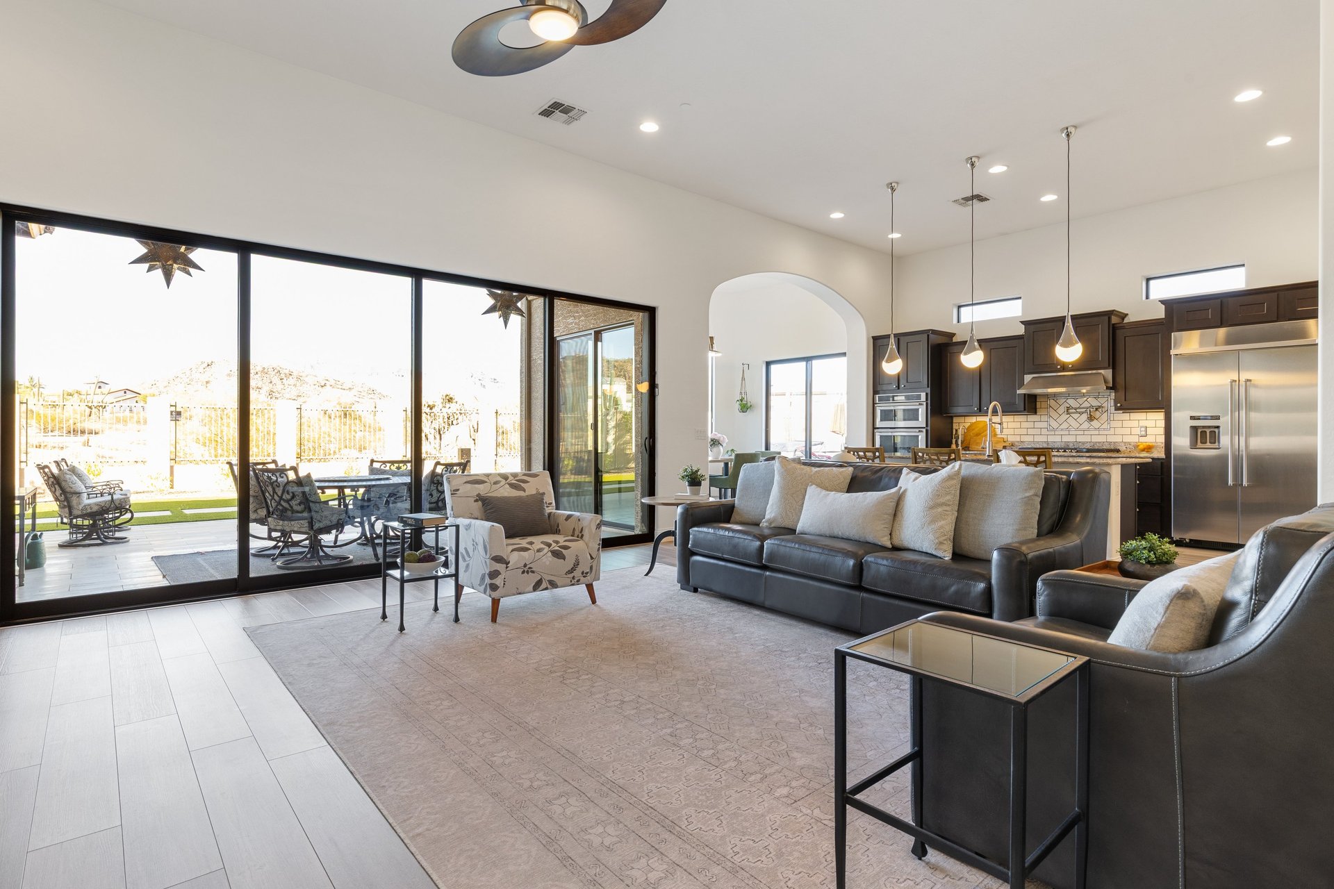 an abstract photo of a curved building with a blue sky in the background
