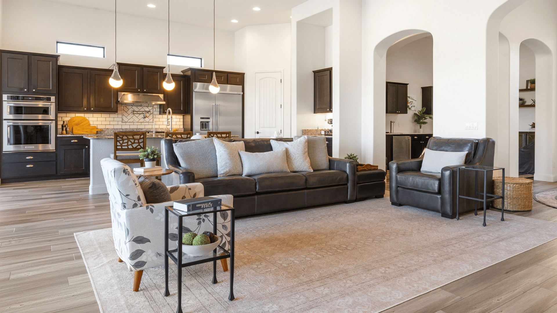 an abstract photo of a curved building with a blue sky in the background