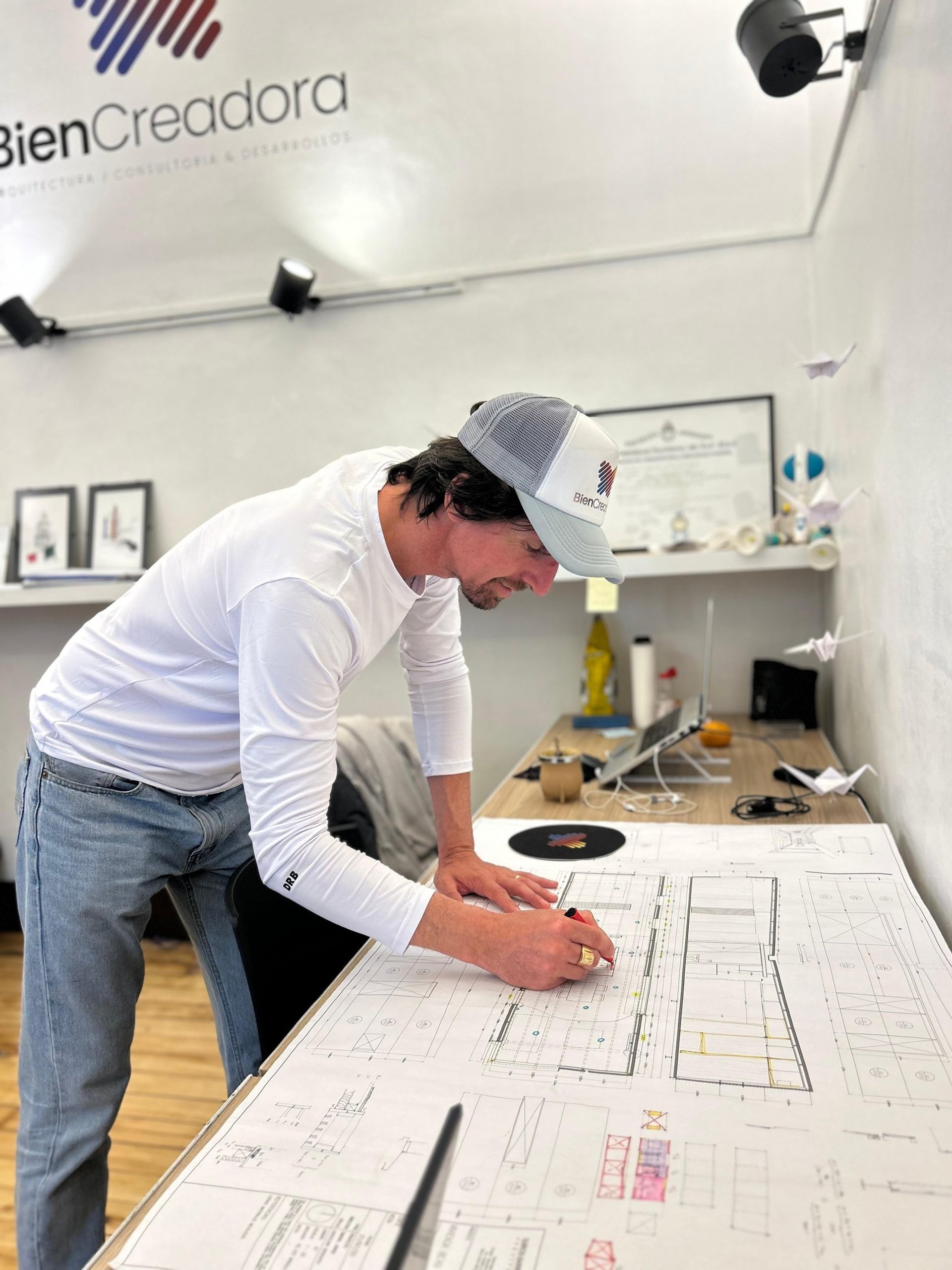 an abstract photo of a curved building with a blue sky in the background