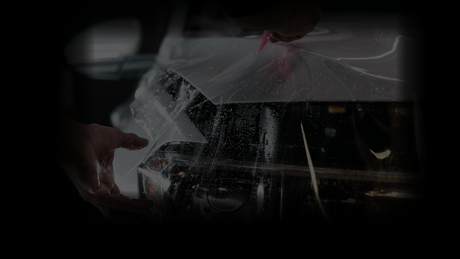 a man is working on a car radio