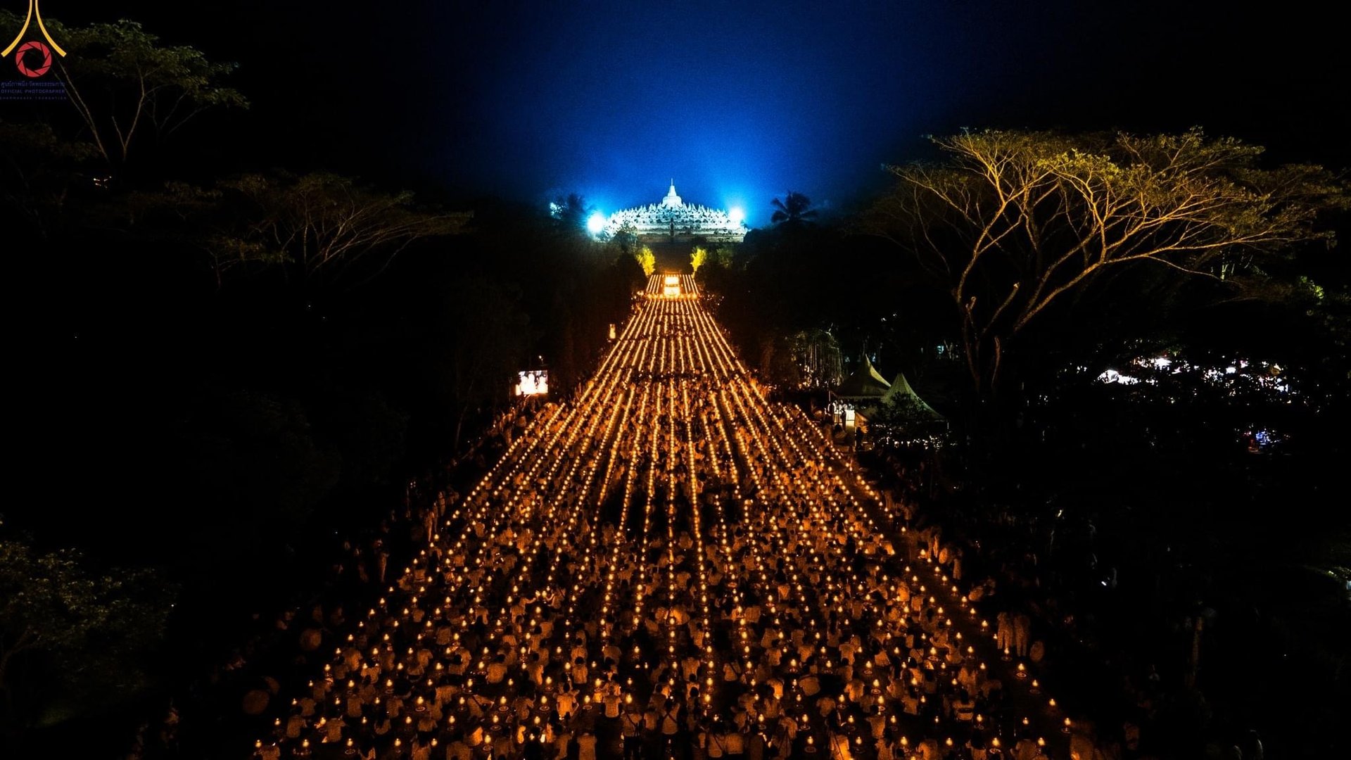 an abstract photo of a curved building with a blue sky in the background