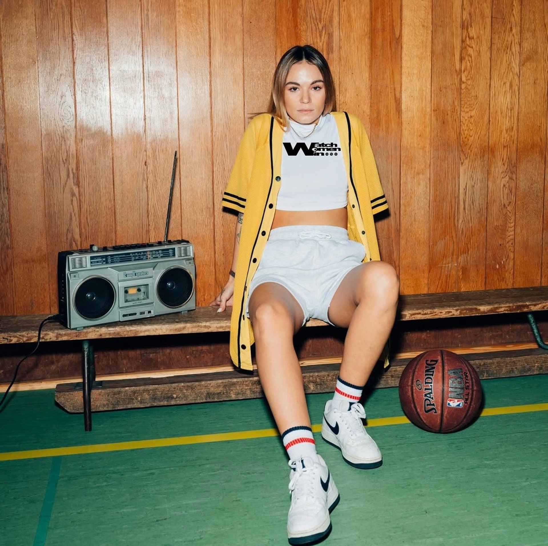 black and brown leather padded tub sofa