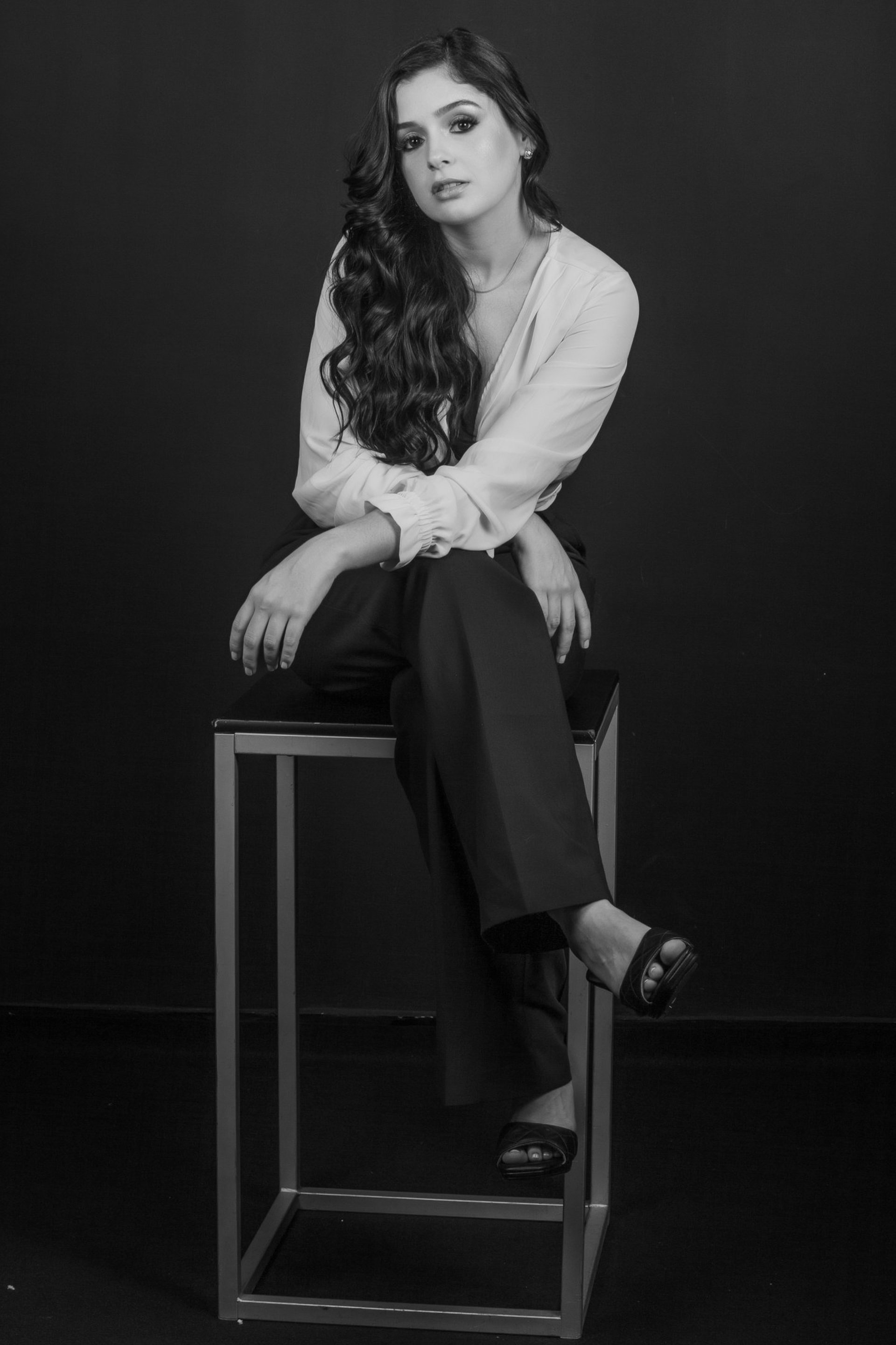 black and brown leather padded tub sofa