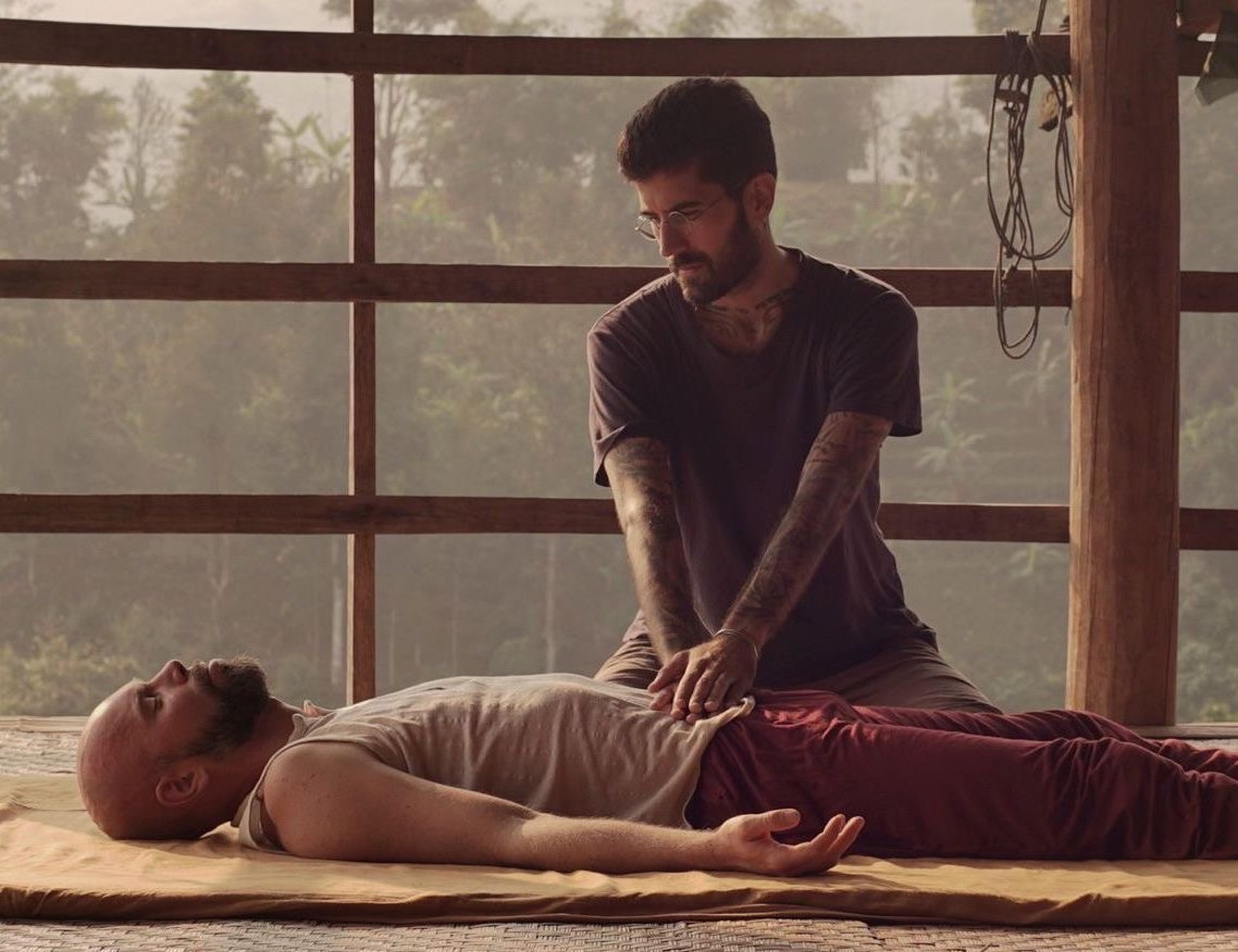 black and brown leather padded tub sofa