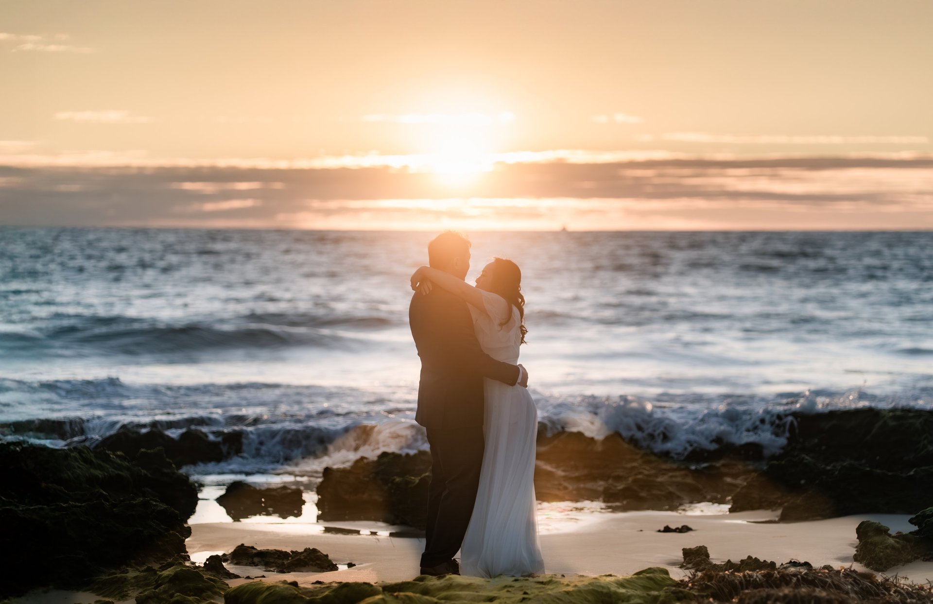 an abstract photo of a curved building with a blue sky in the background
