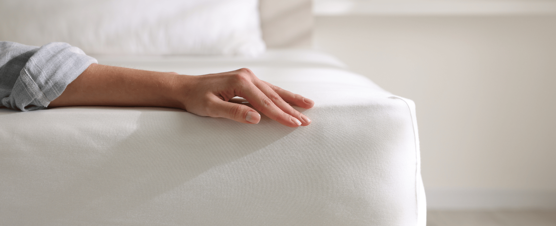 Close-up of a white quilted mattress top