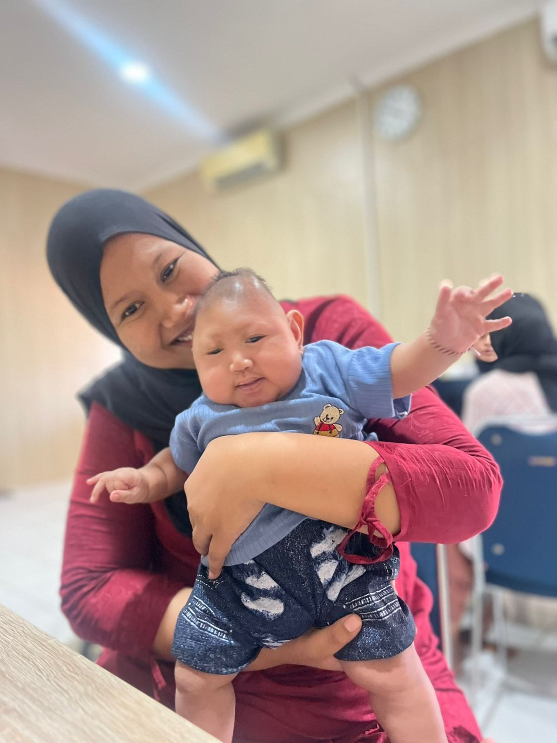 an abstract photo of a curved building with a blue sky in the background