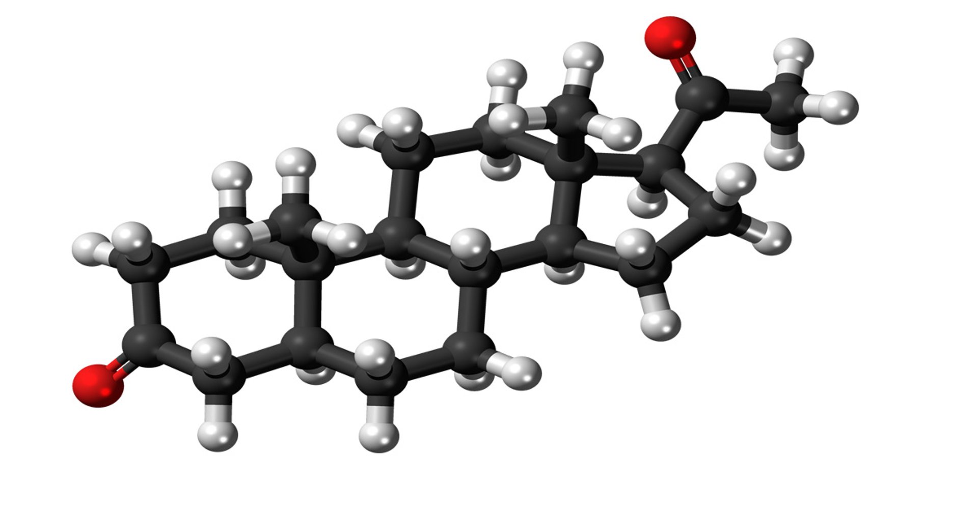 a person holding a smart phone next to an electronic device