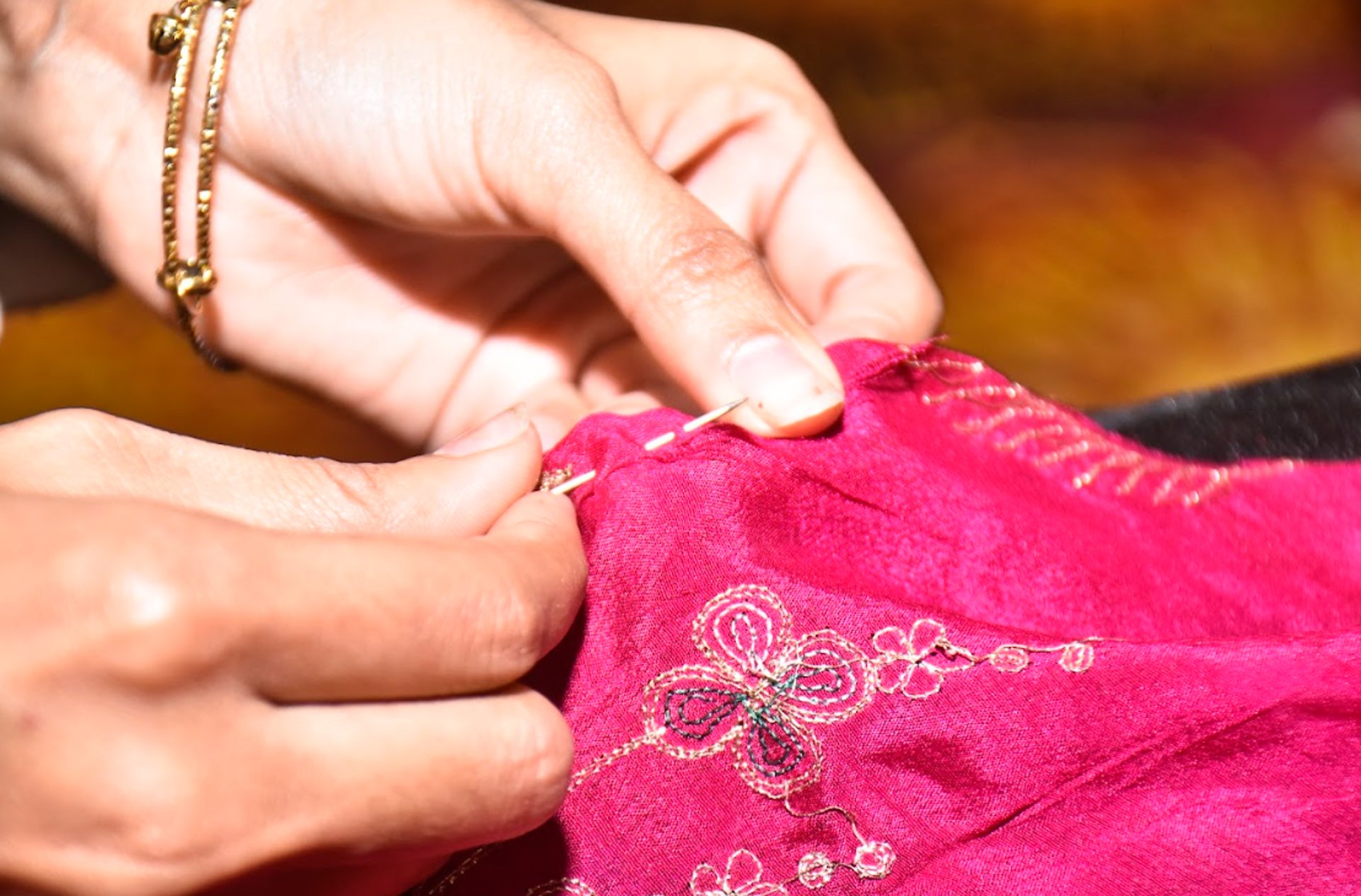 an abstract photo of a curved building with a blue sky in the background