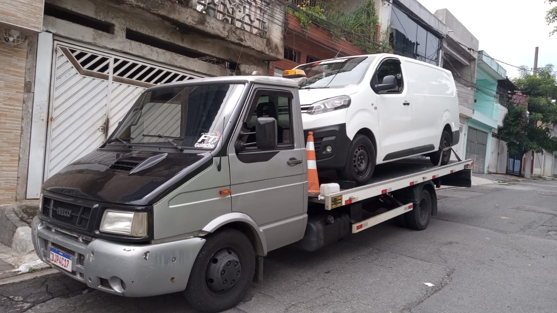 black and brown leather padded tub sofa