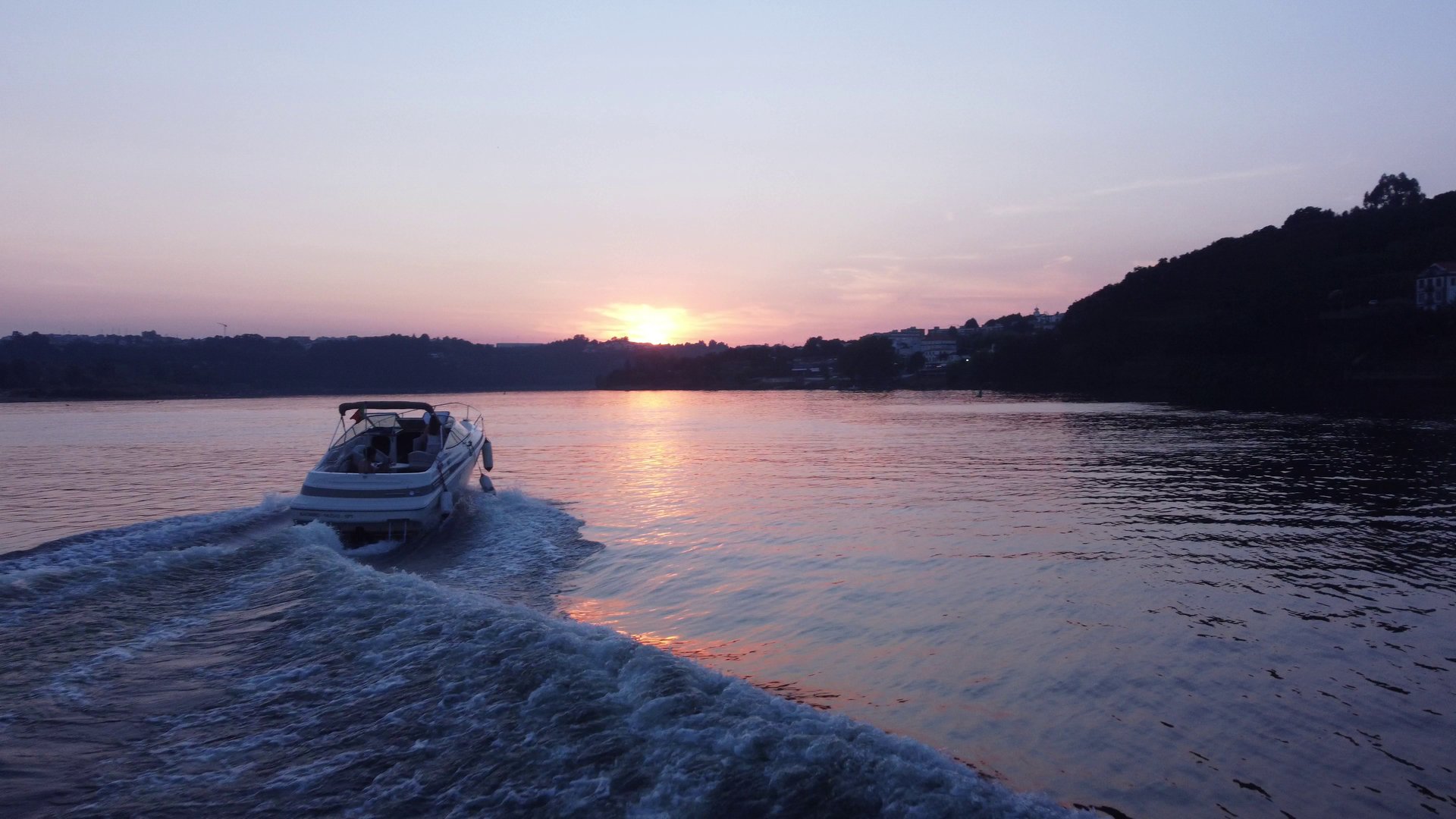 an abstract photo of a curved building with a blue sky in the background