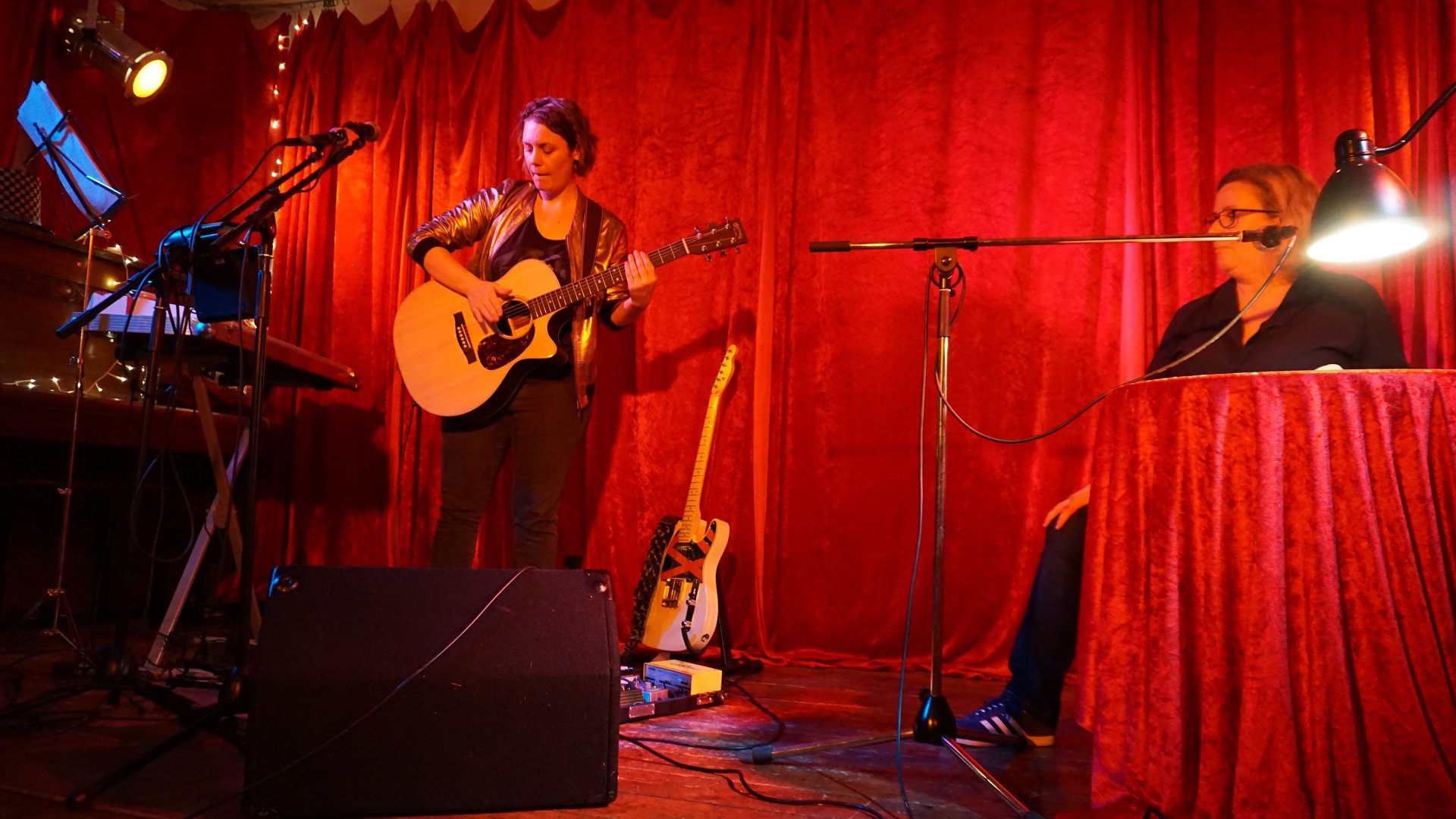woman wearing yellow long-sleeved dress under white clouds and blue sky during daytime