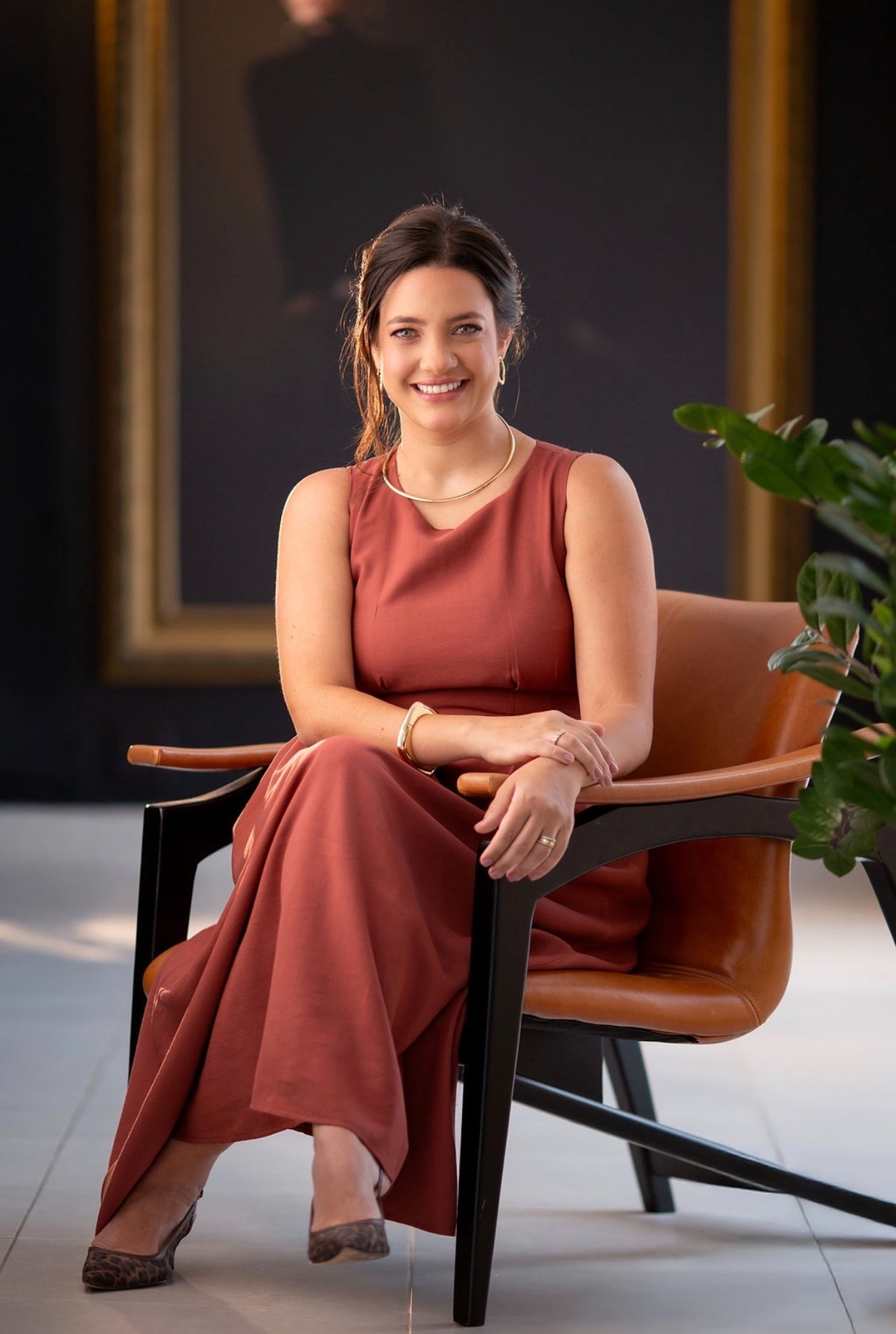 an abstract photo of a curved building with a blue sky in the background
