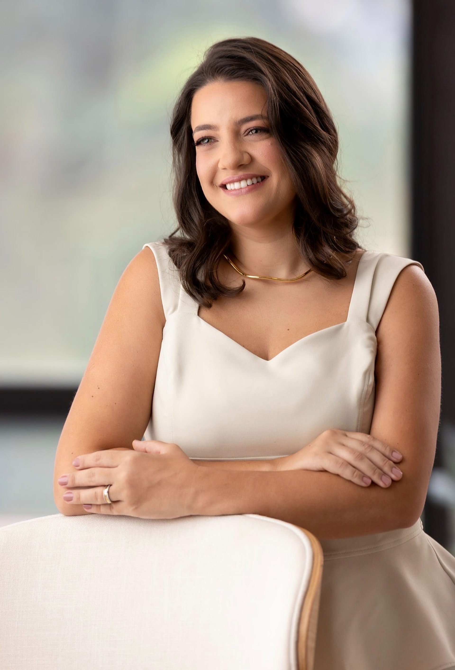 an abstract photo of a curved building with a blue sky in the background