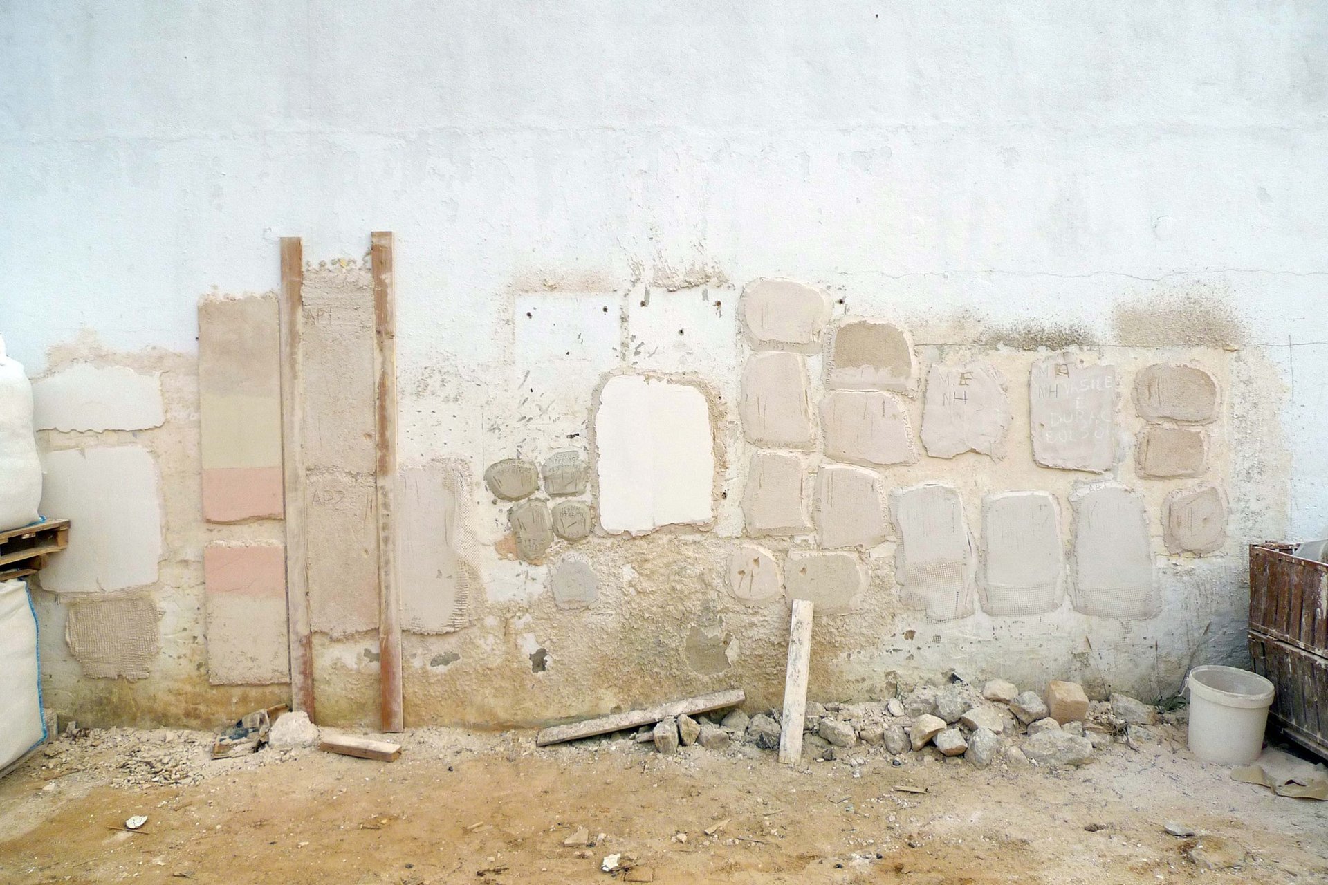 an abstract photo of a curved building with a blue sky in the background