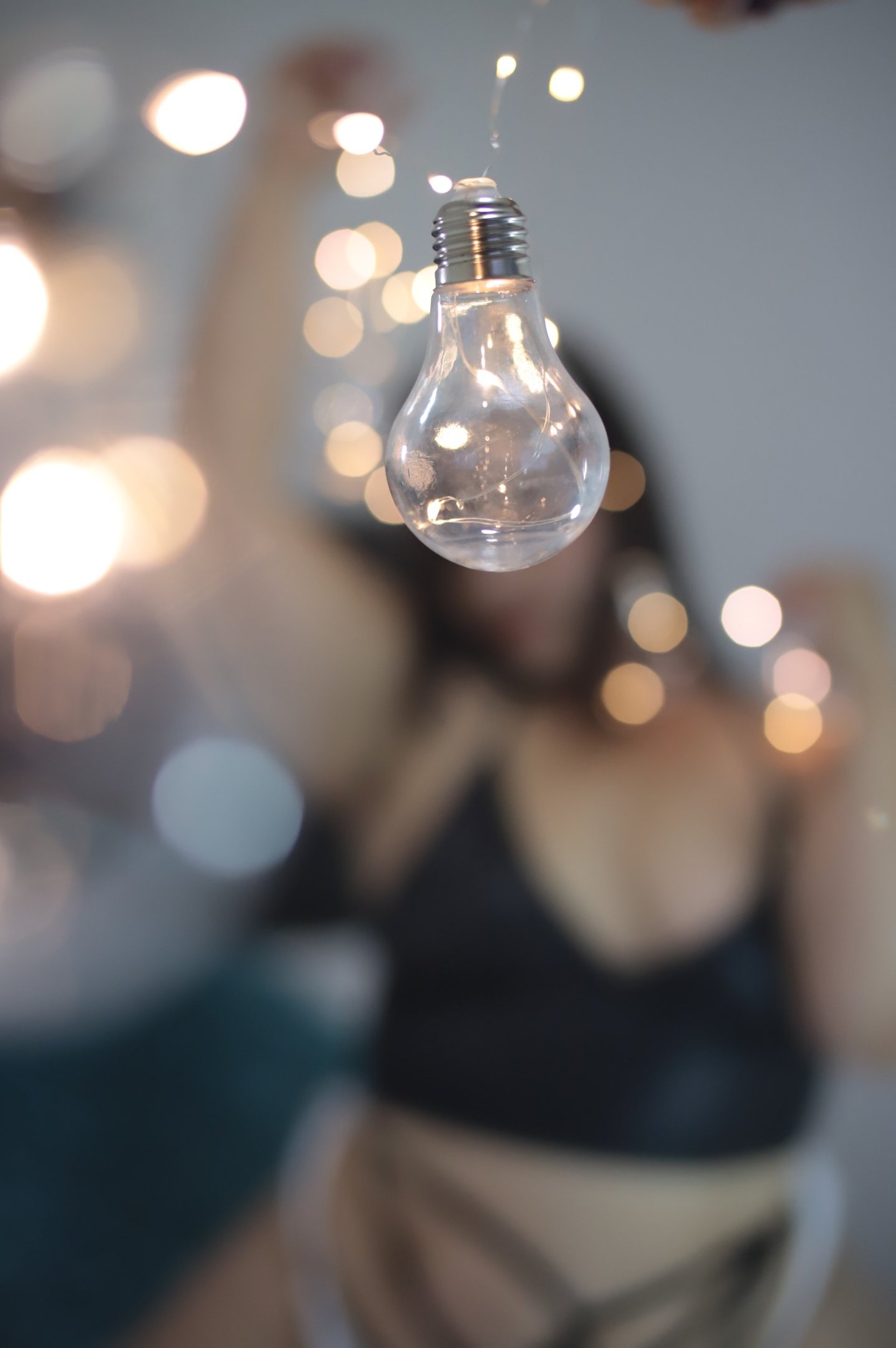an abstract photo of a curved building with a blue sky in the background