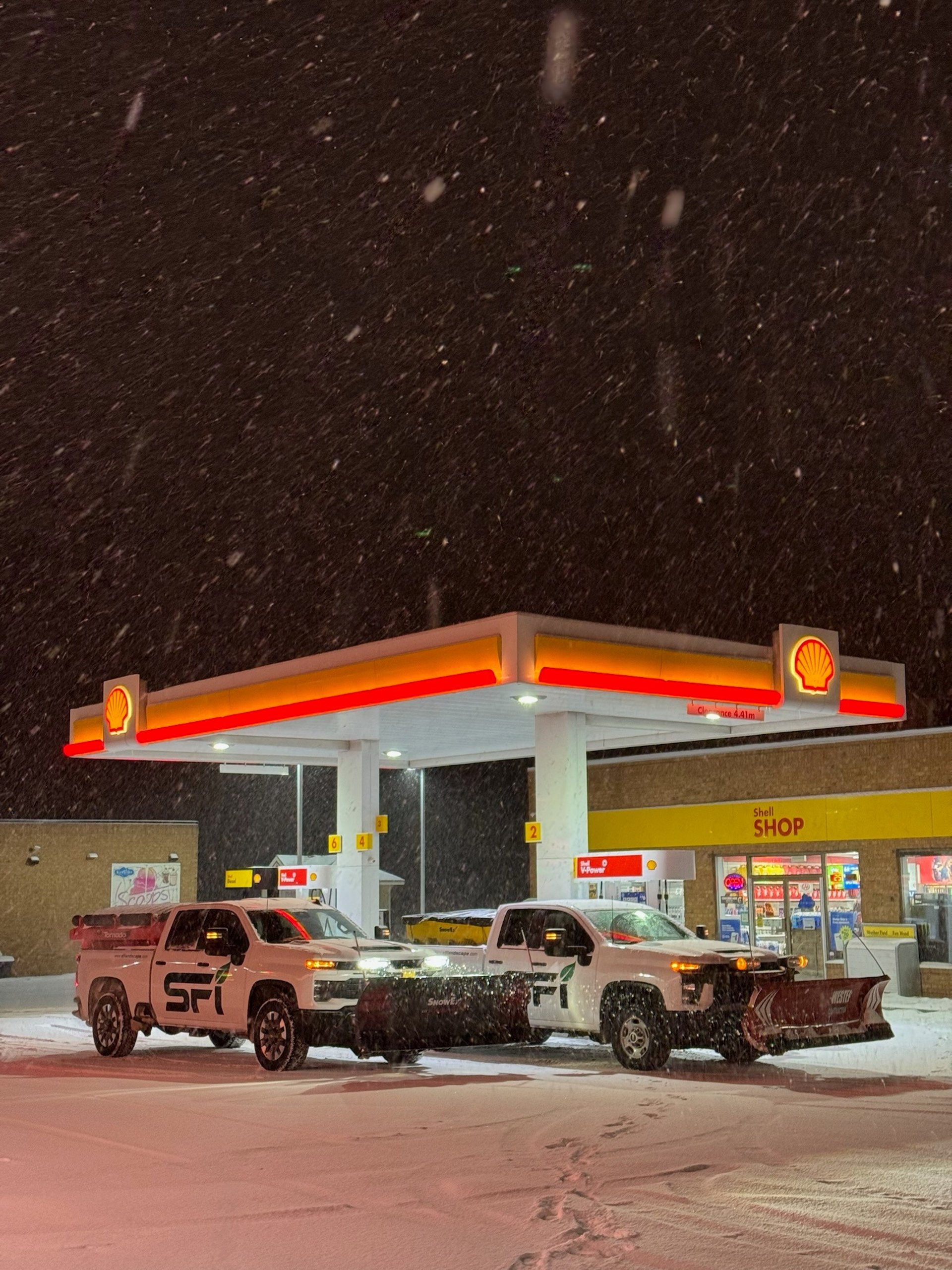 an abstract photo of a curved building with a blue sky in the background