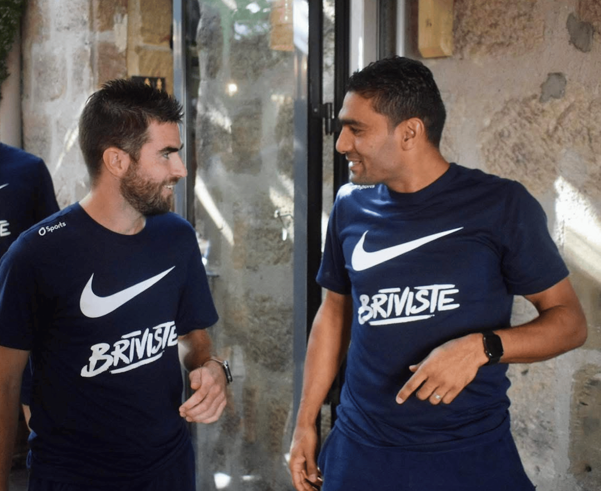 an abstract photo of a curved building with a blue sky in the background