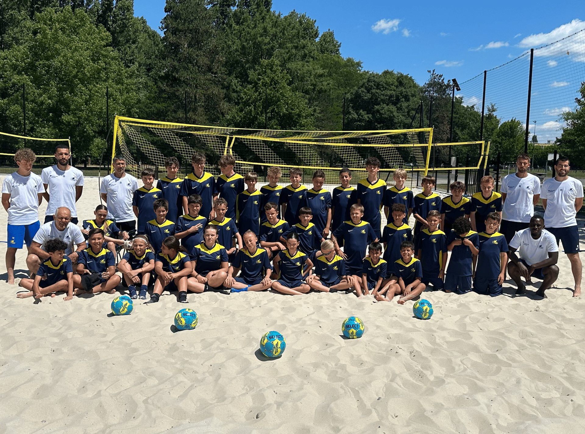 an abstract photo of a curved building with a blue sky in the background
