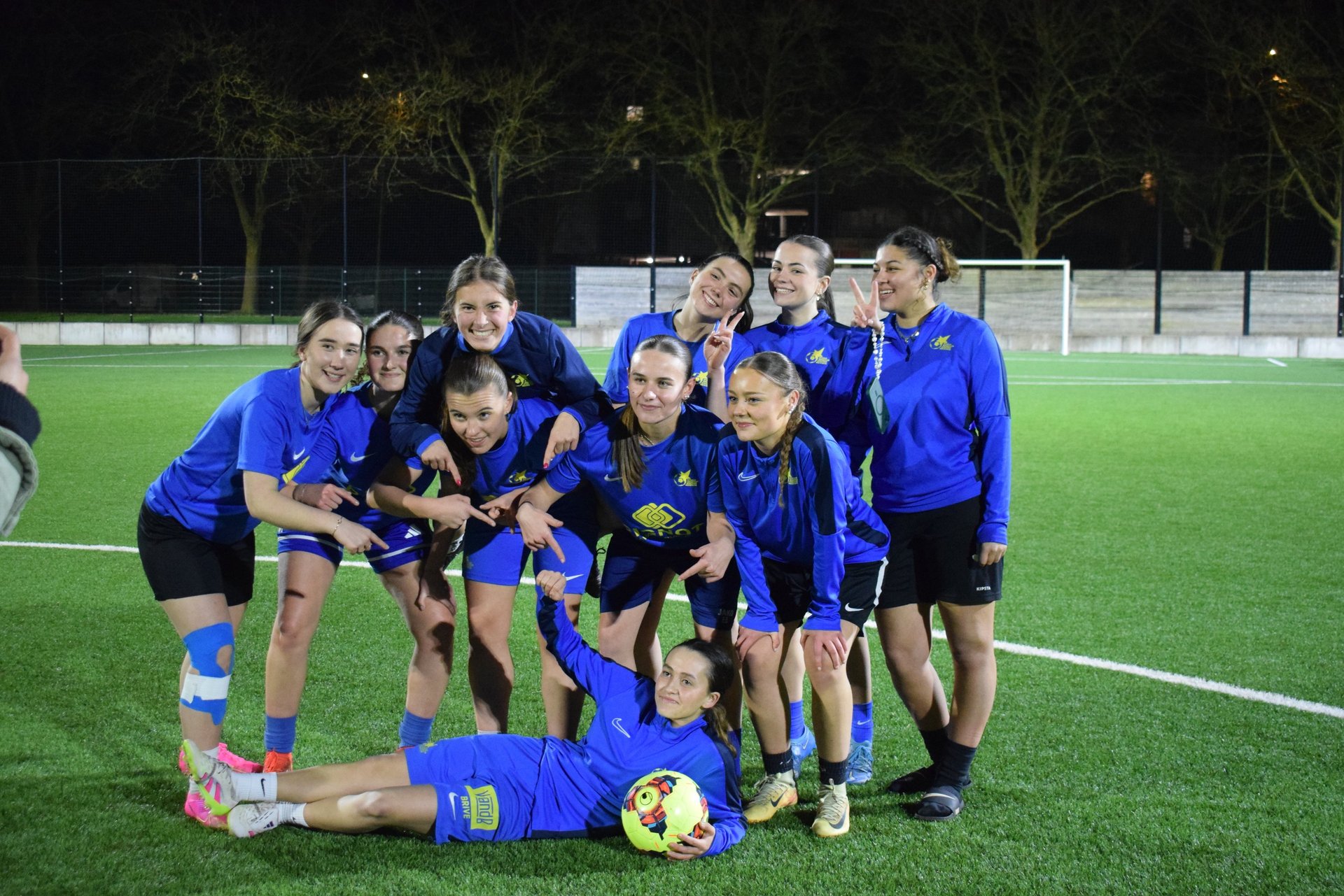 an abstract photo of a curved building with a blue sky in the background