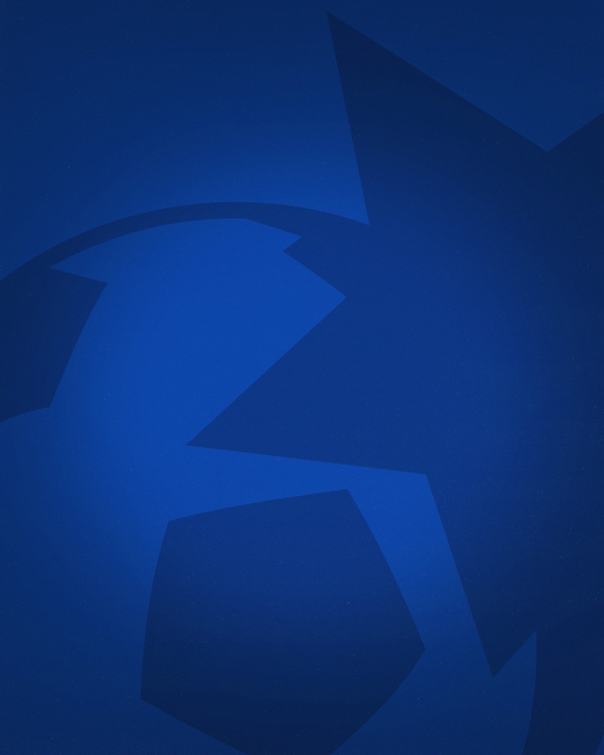 an abstract photo of a curved building with a blue sky in the background