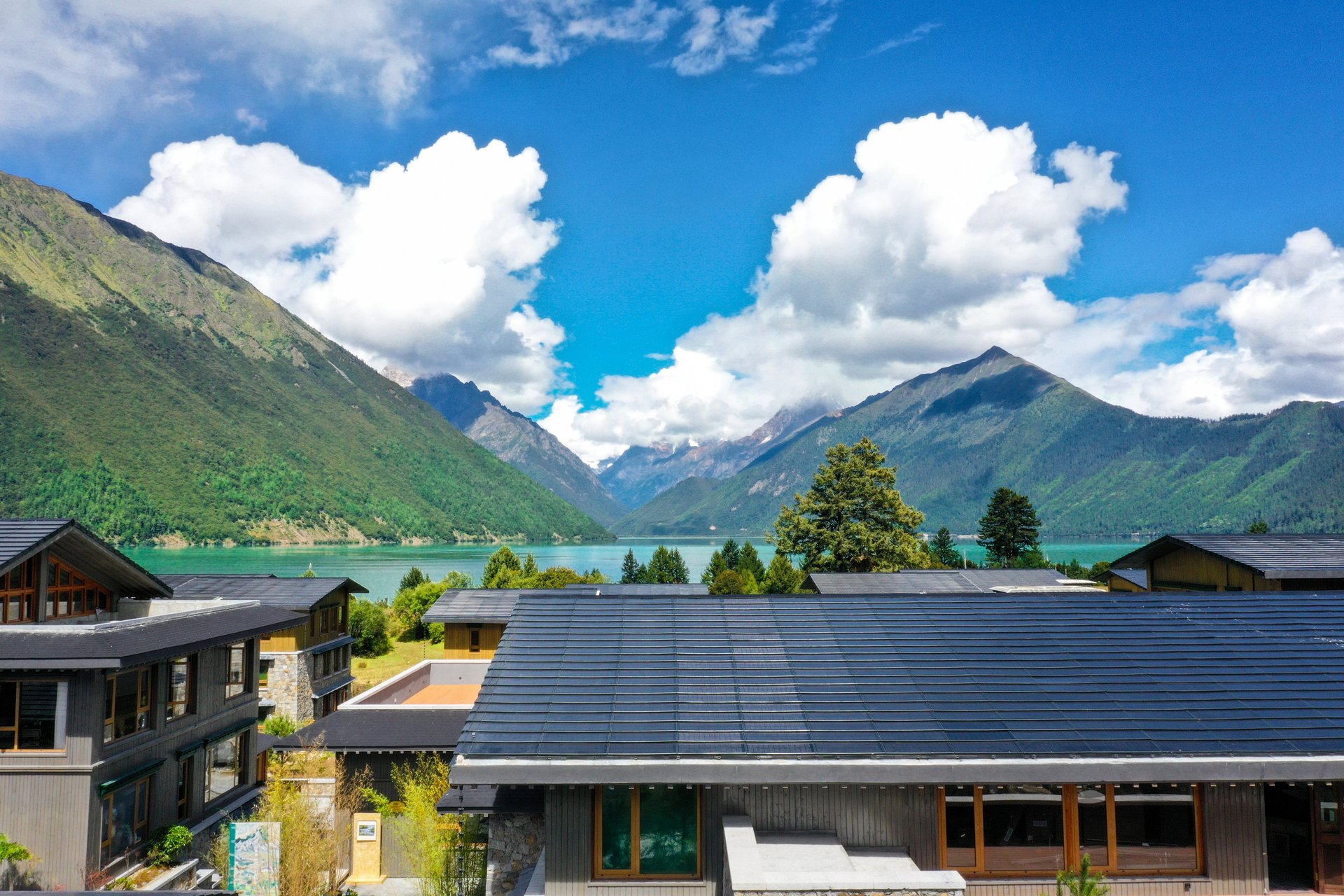 an abstract photo of a curved building with a blue sky in the background