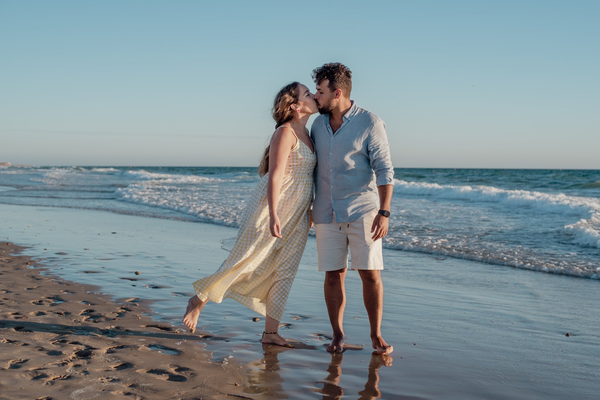 couple wearing silver-colored rings