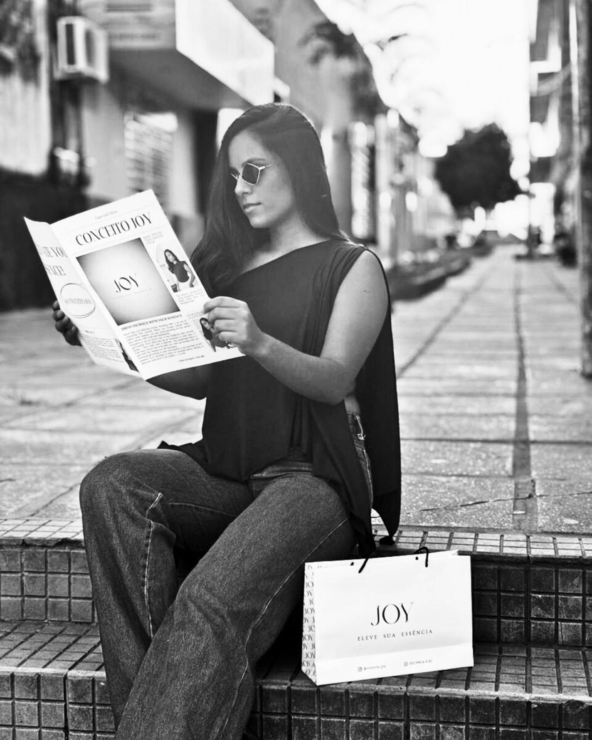 person wearing grey knit sweater