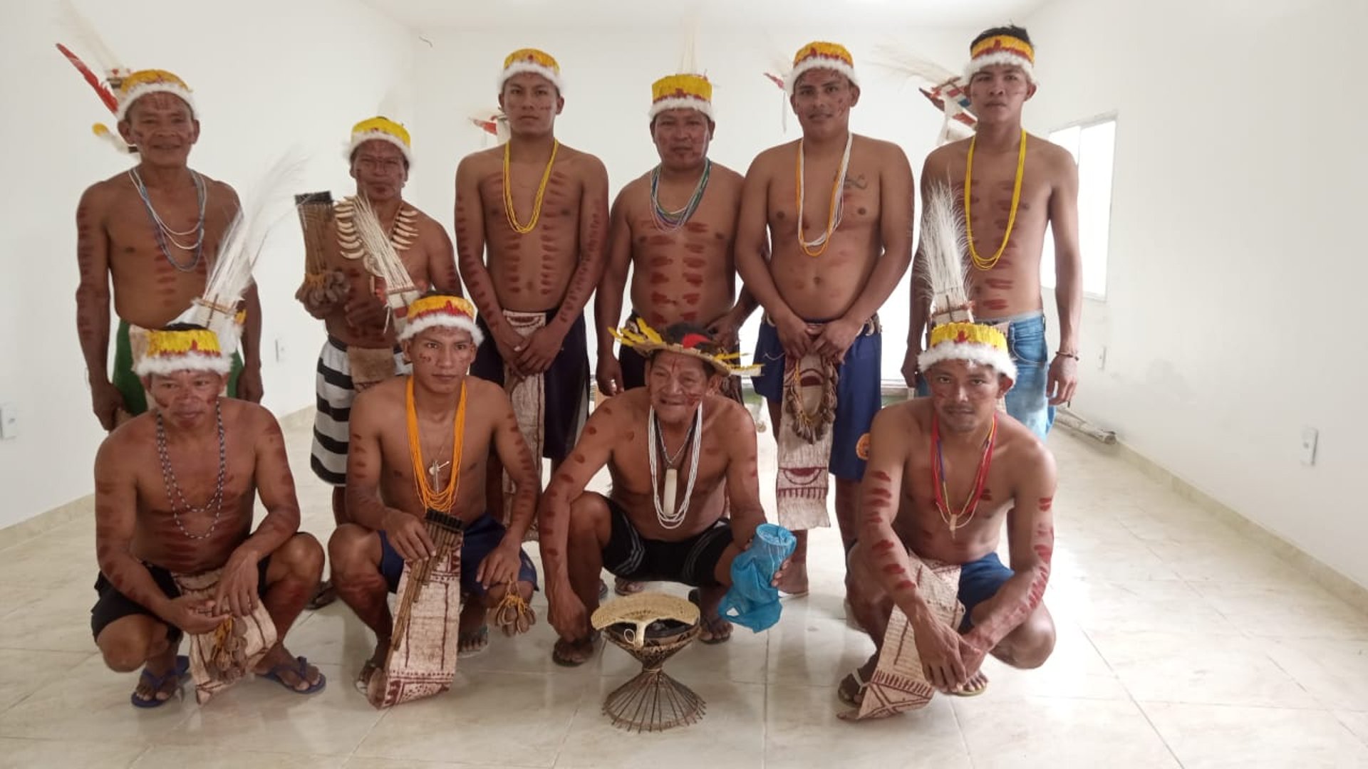 woman wearing yellow long-sleeved dress under white clouds and blue sky during daytime