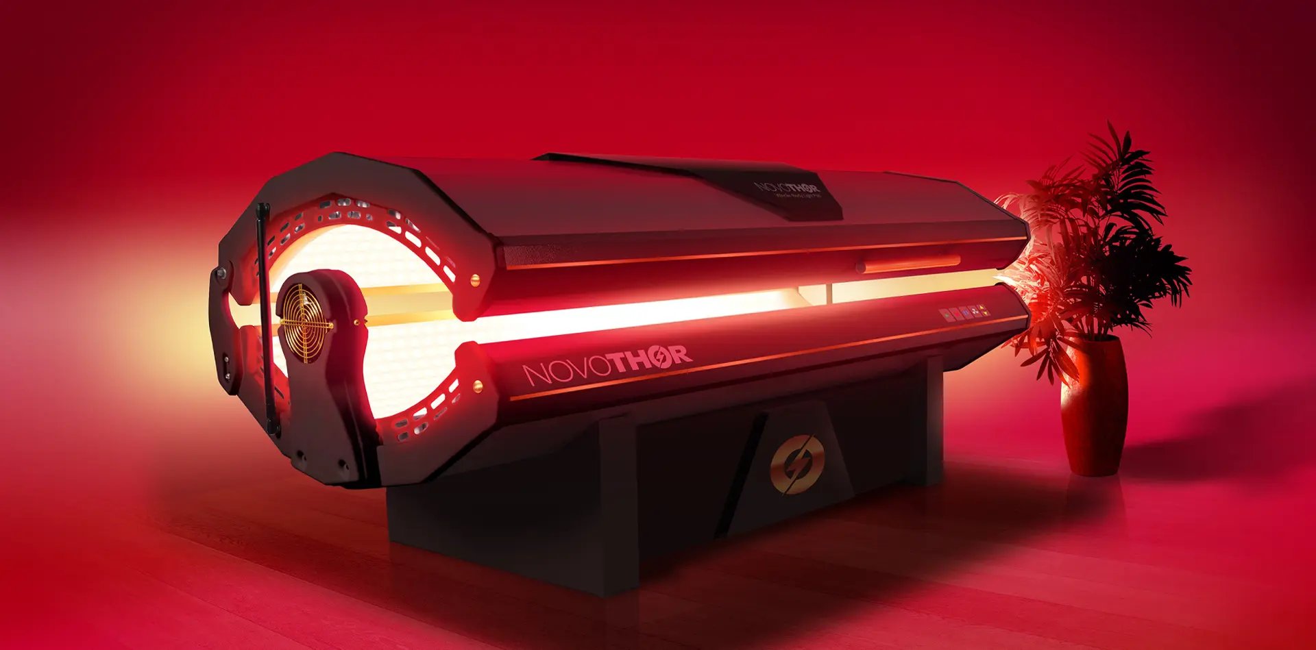 an empty room with a red light coming from the ceiling