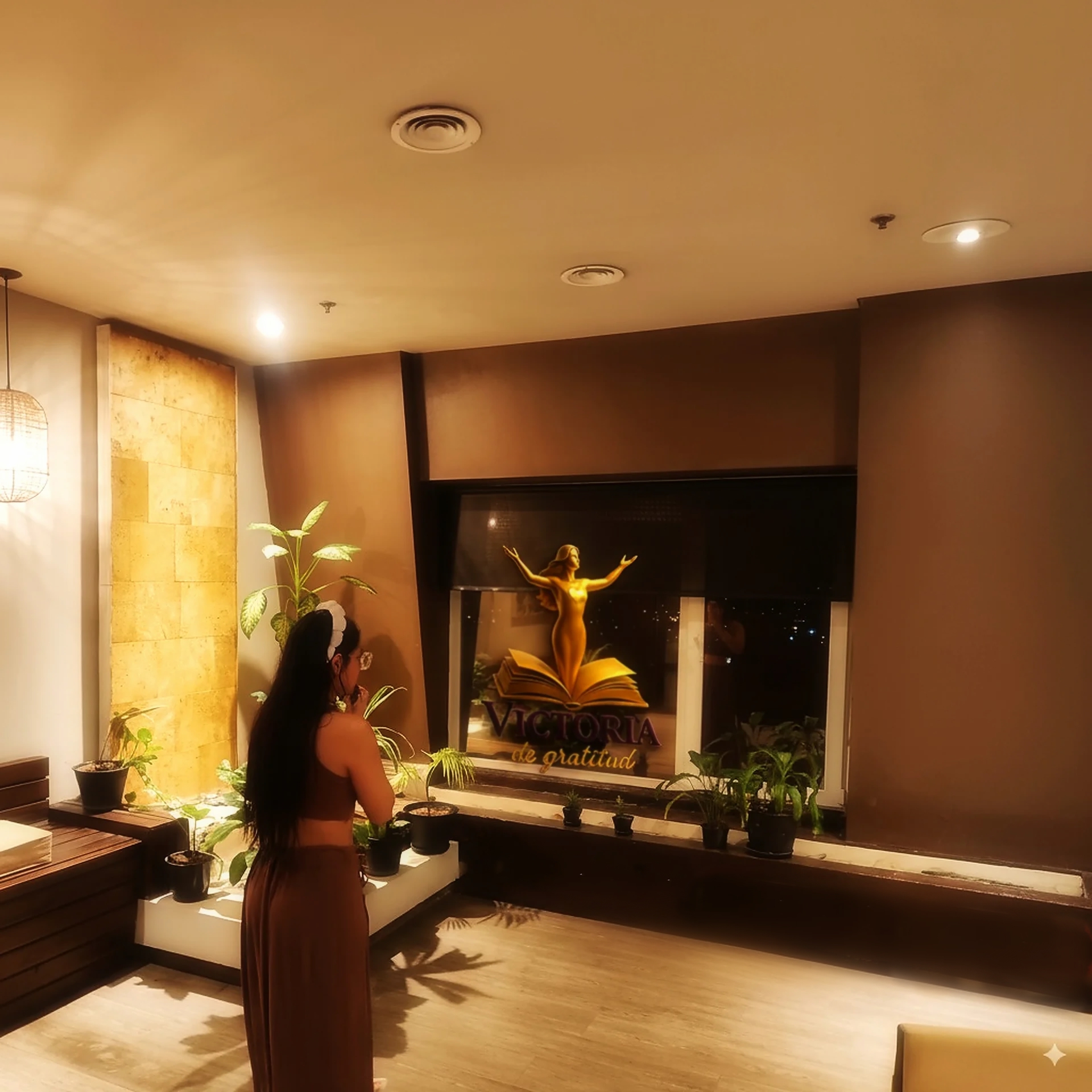 woman in black tank top sitting on brown wooden dock during daytime