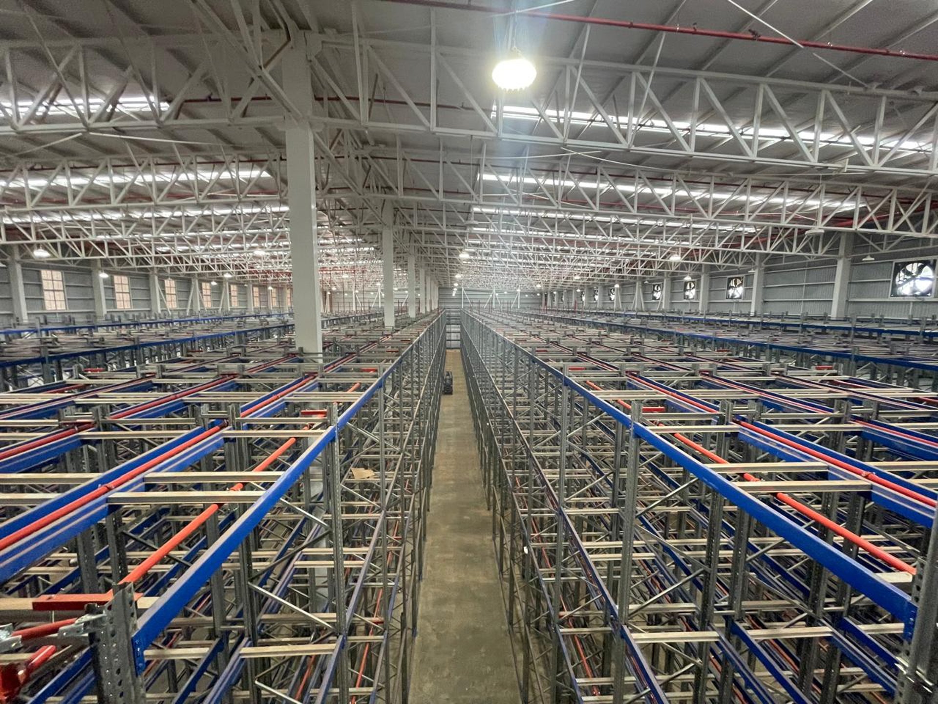 woman wearing yellow long-sleeved dress under white clouds and blue sky during daytime