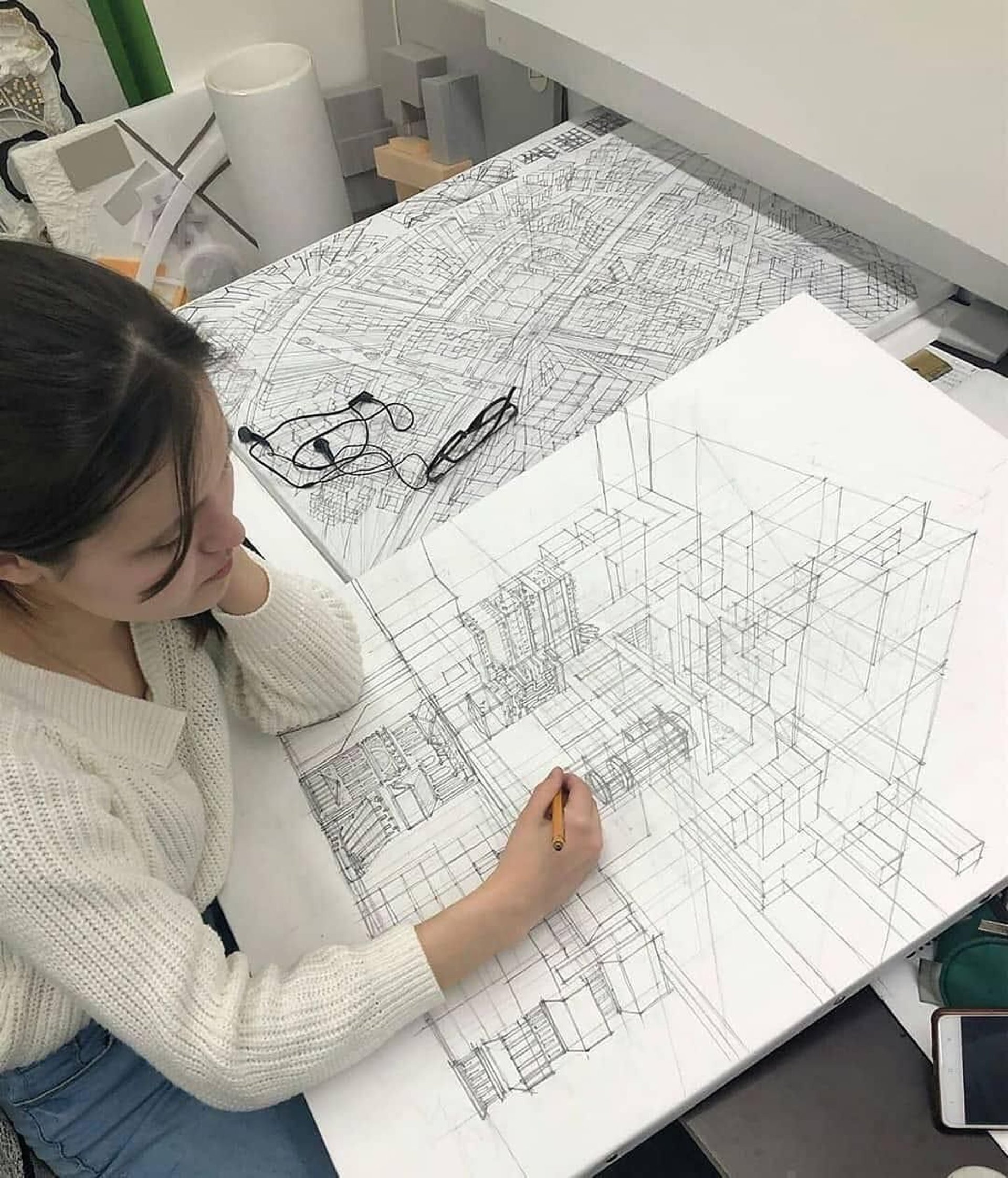 person holding black magnifying glass