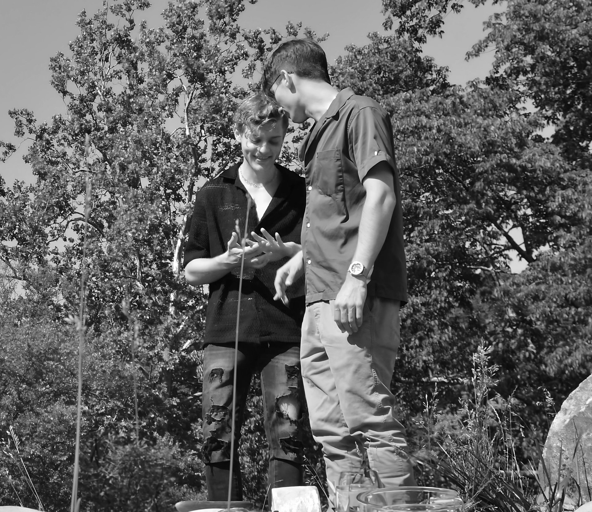 couple wearing silver-colored rings