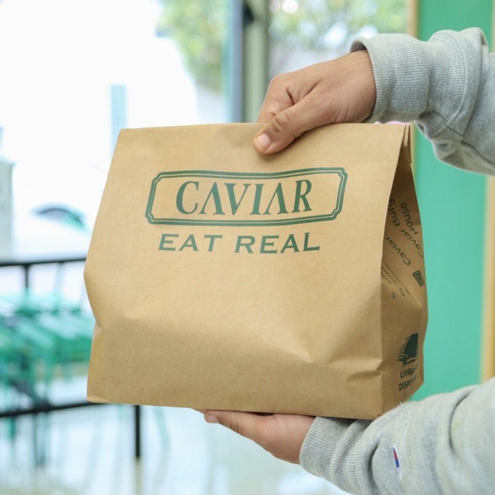 an abstract photo of a curved building with a blue sky in the background