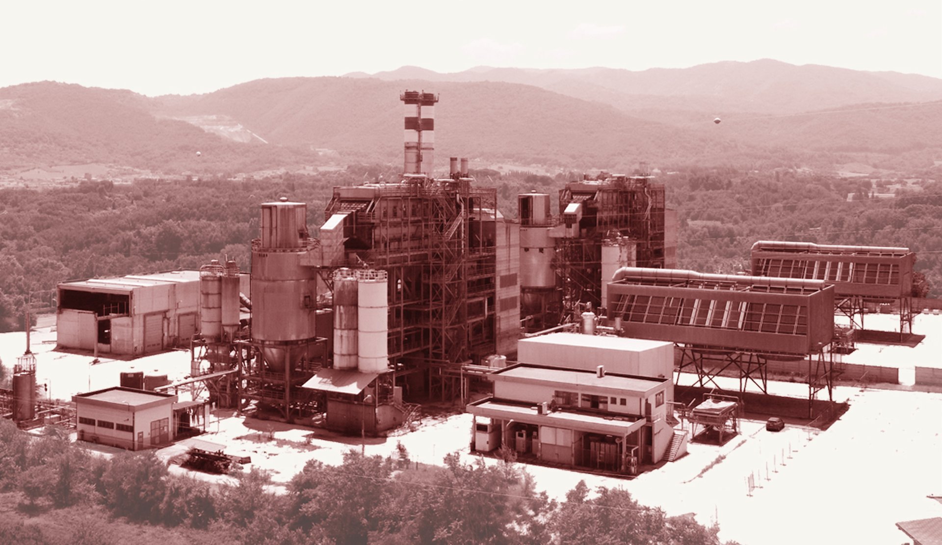 an abstract photo of a curved building with a blue sky in the background