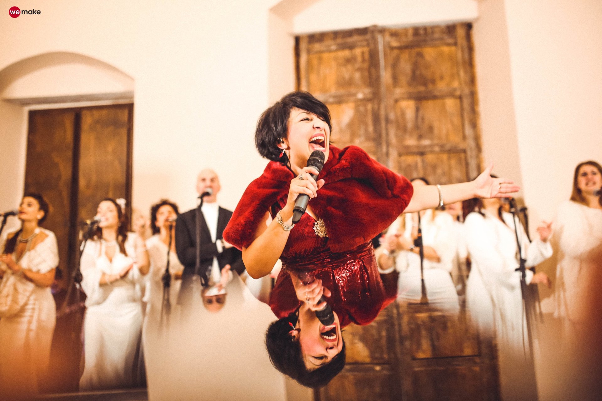 a close up of a black and brown abstract painting