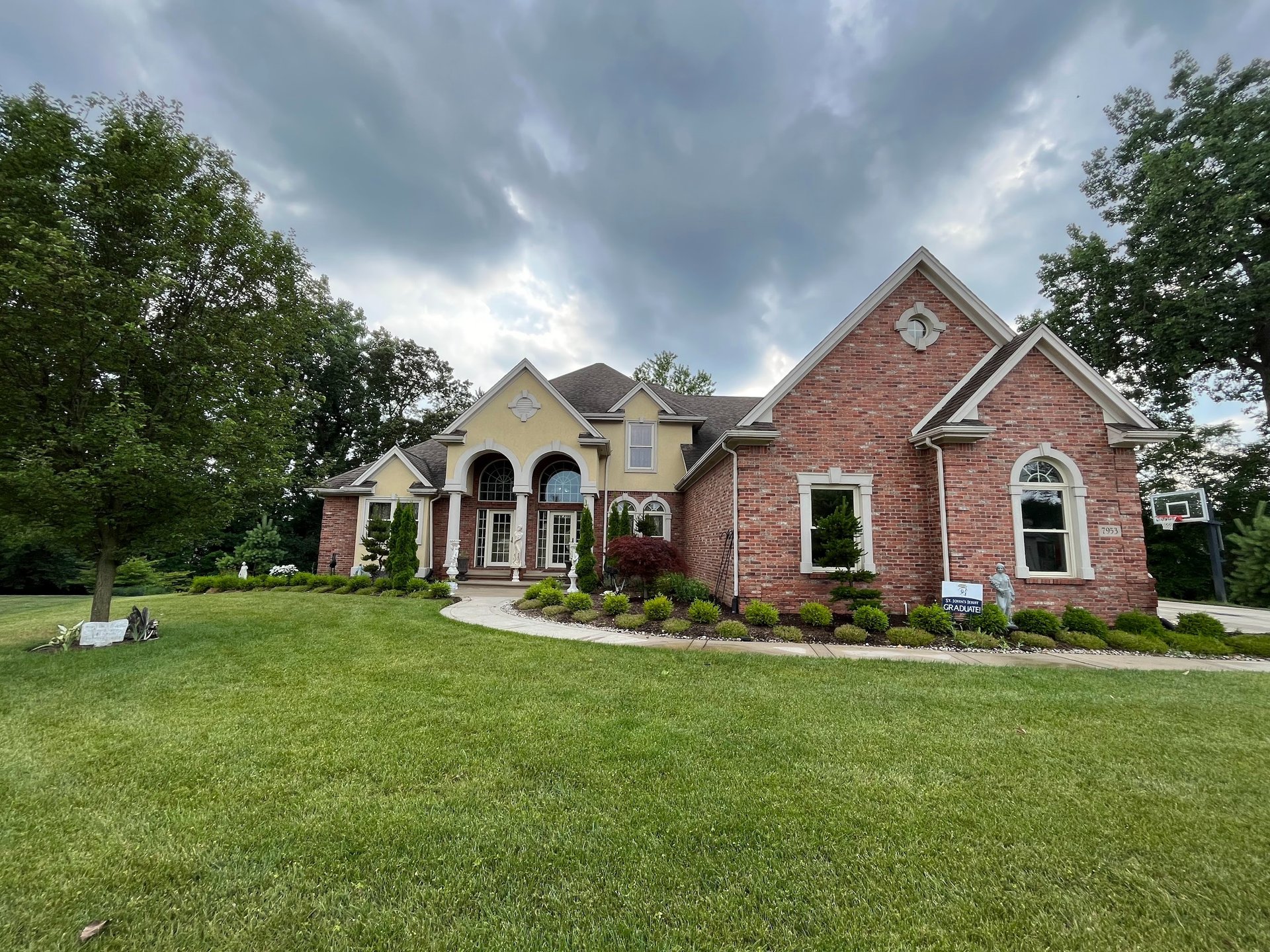 woman wearing yellow long-sleeved dress under white clouds and blue sky during daytime