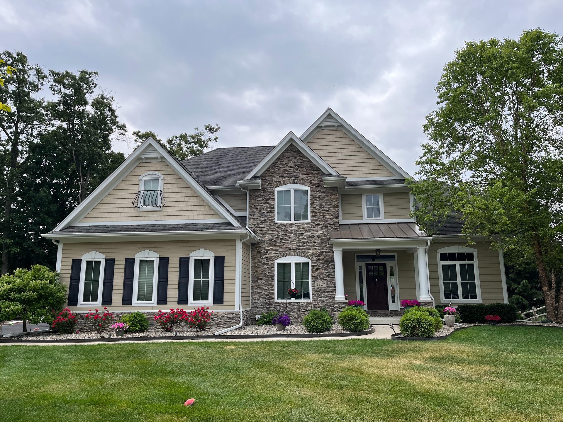 black and brown leather padded tub sofa