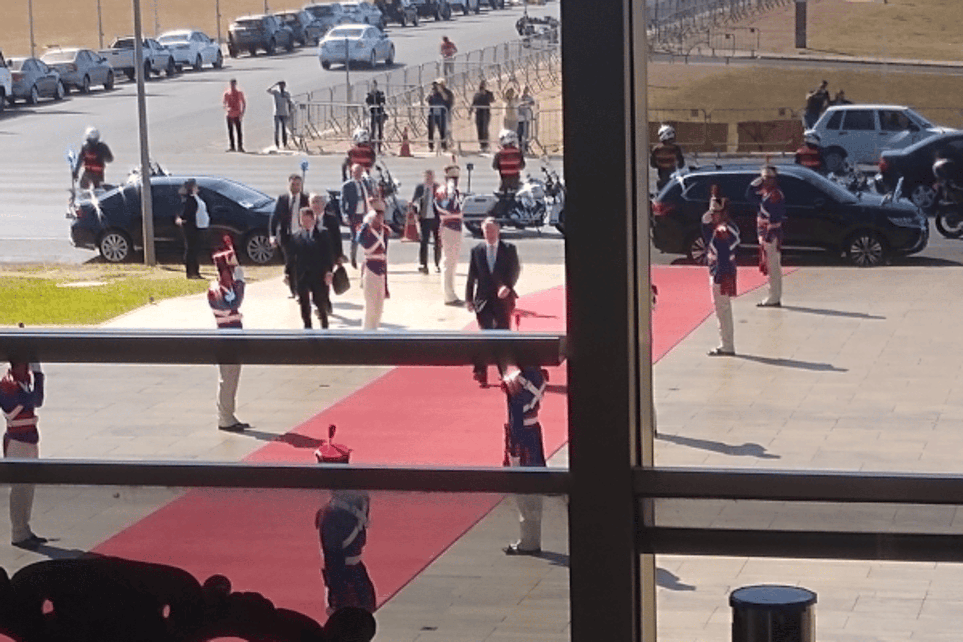 woman wearing yellow long-sleeved dress under white clouds and blue sky during daytime