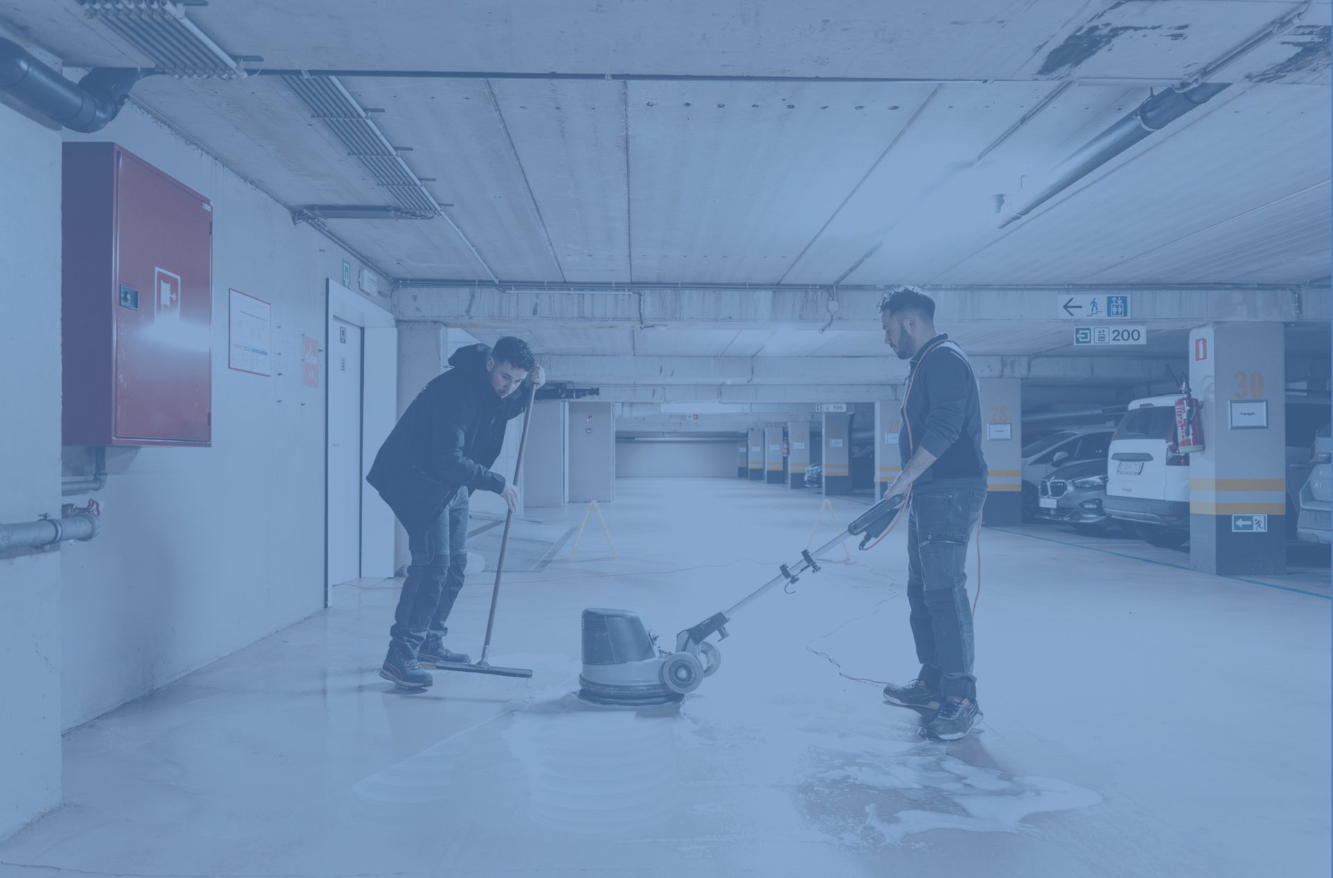 an abstract photo of a curved building with a blue sky in the background