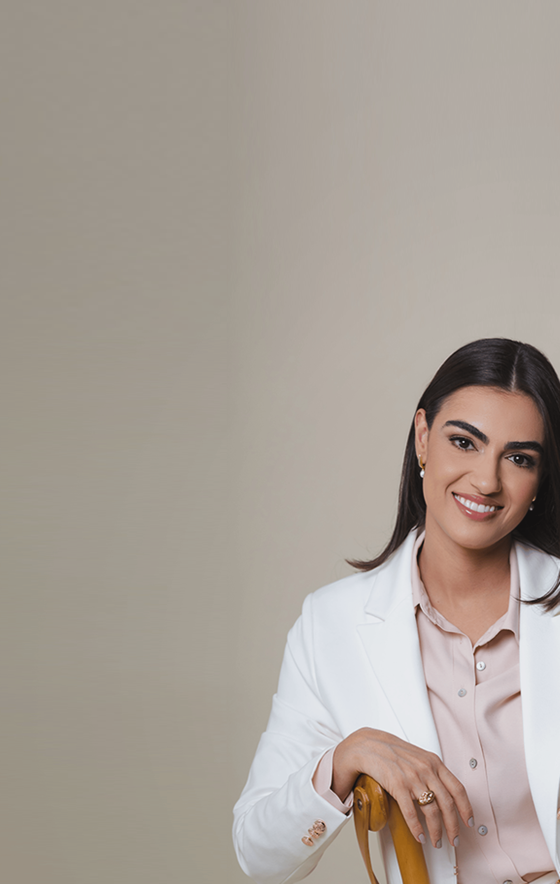an abstract photo of a curved building with a blue sky in the background