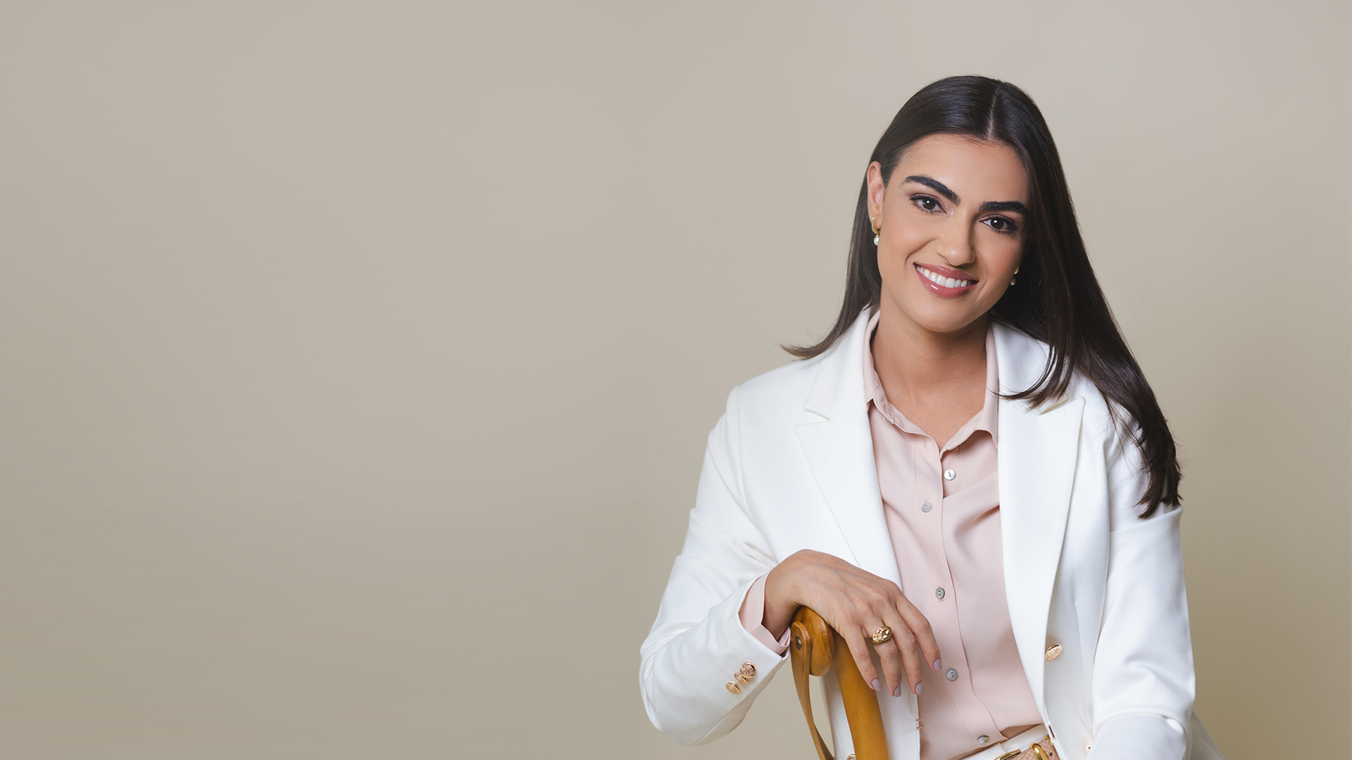 an abstract photo of a curved building with a blue sky in the background