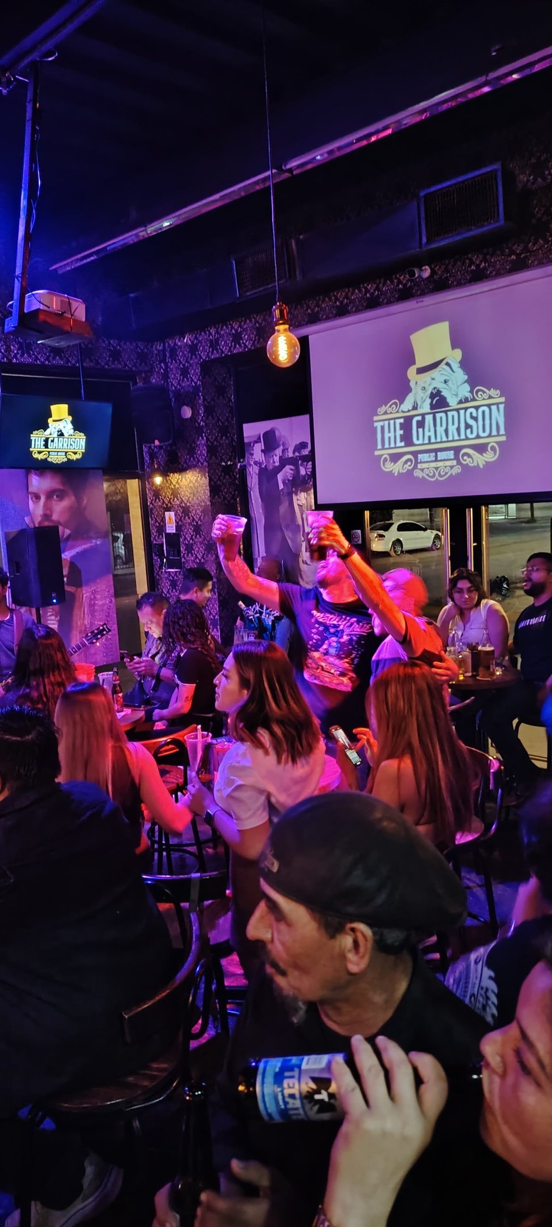 black and brown leather padded tub sofa