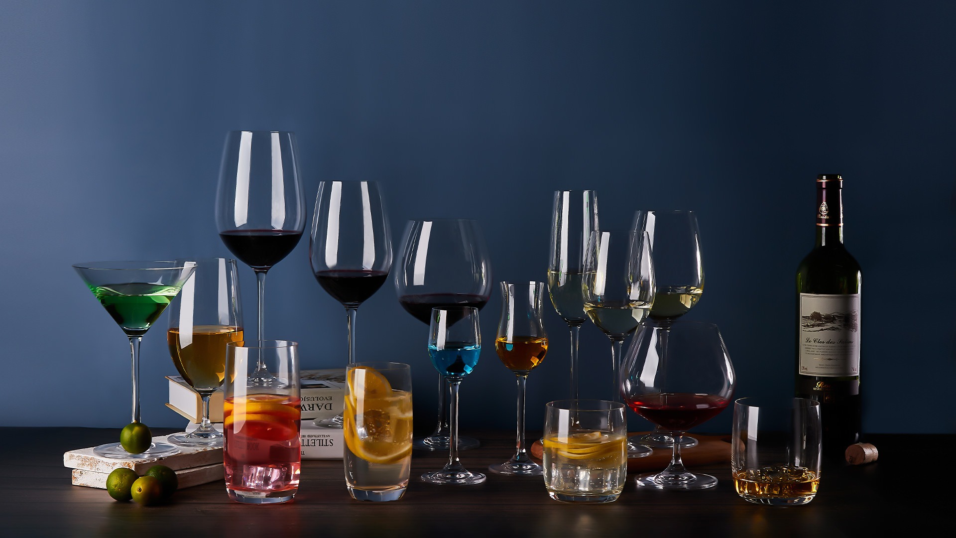 a person pouring wine into a glass on a table